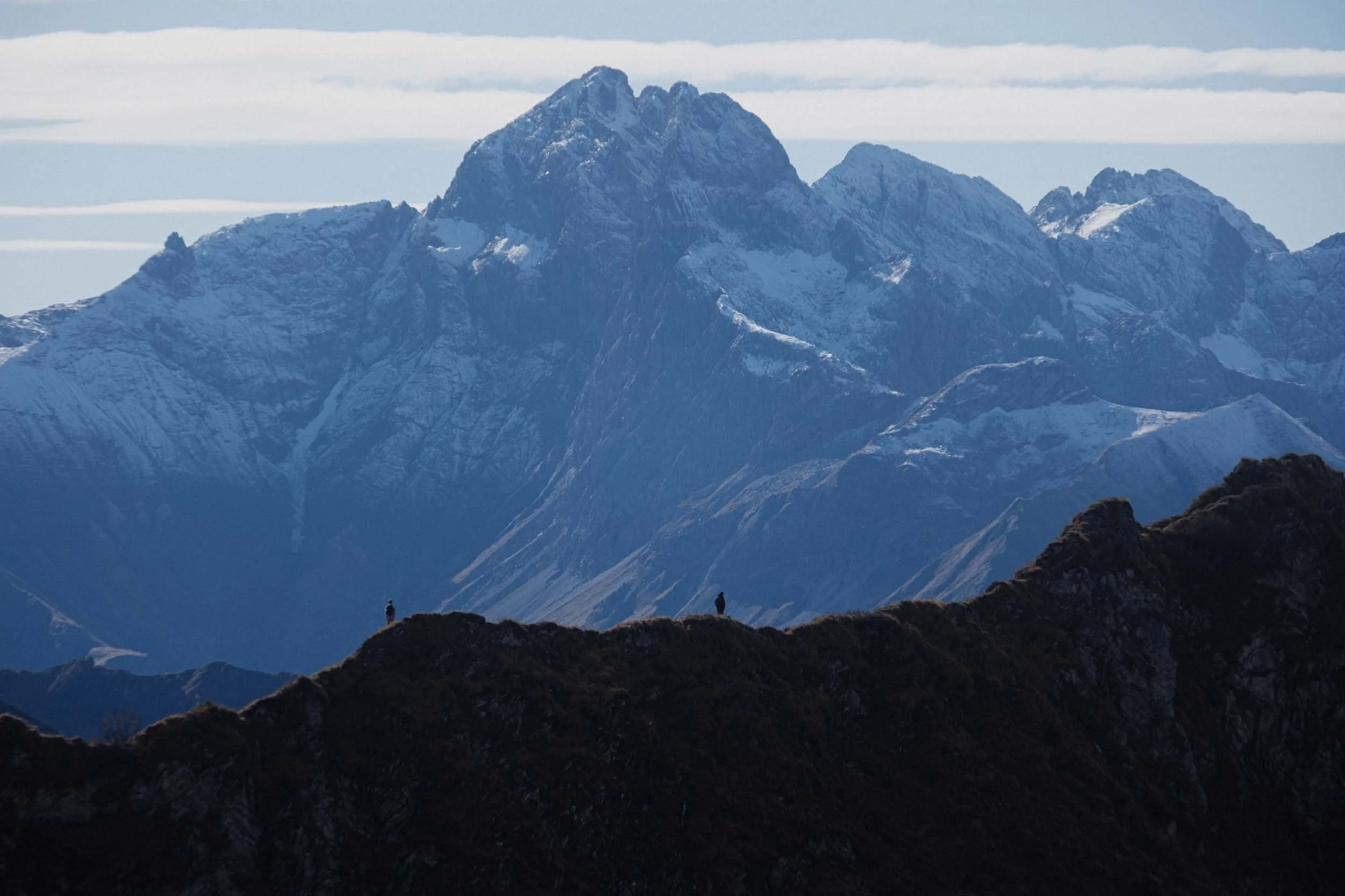 two person standing on mountain ridge near nebelhorn