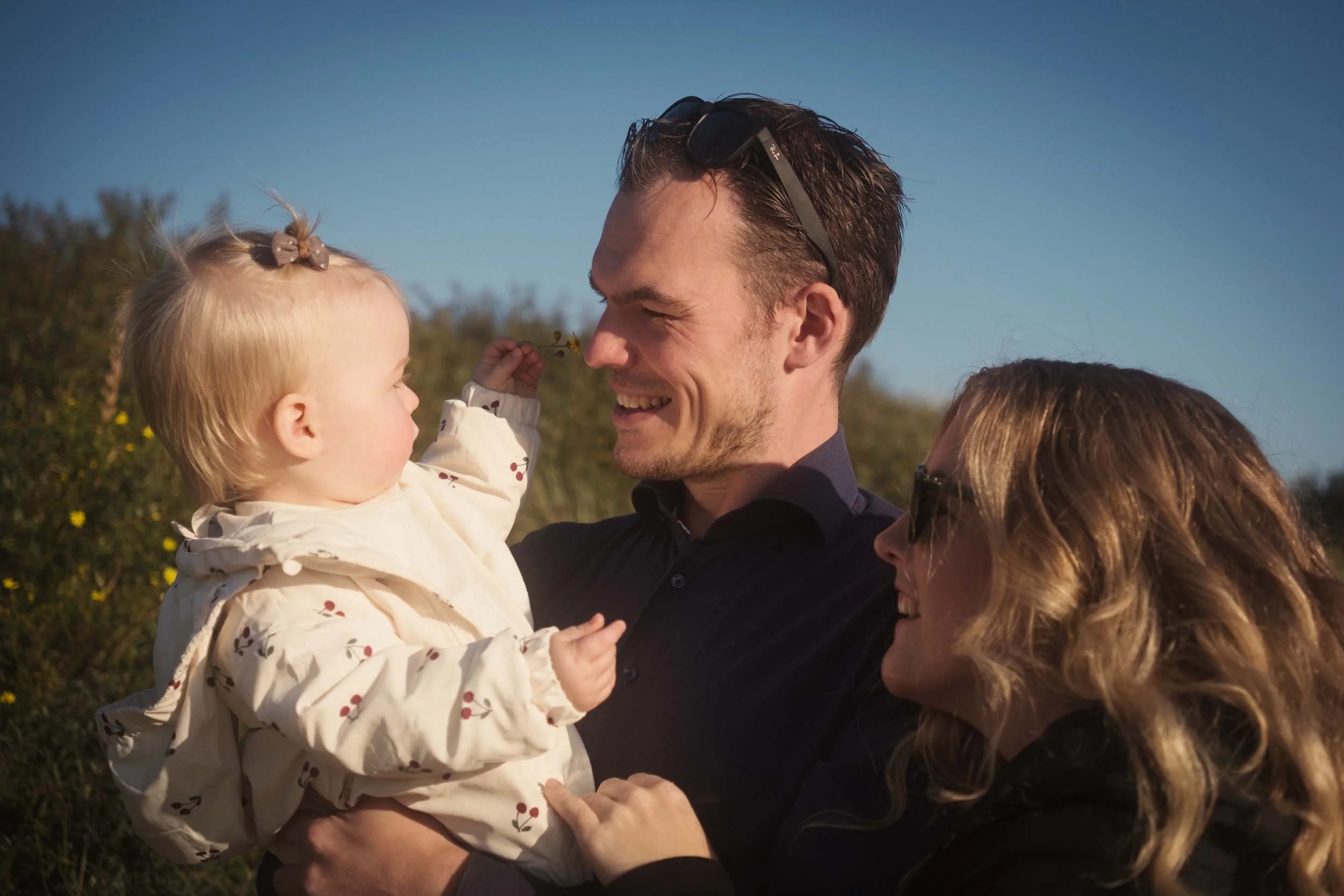 cute family moment in low sunlight