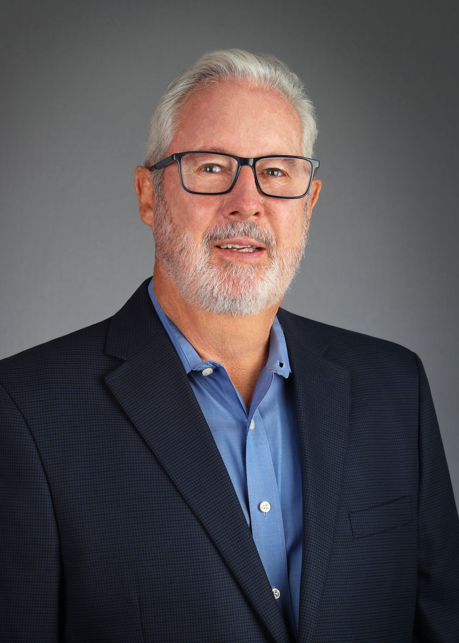 A professional portrait of an Bob Stone, executive vice president of NUVIS.
