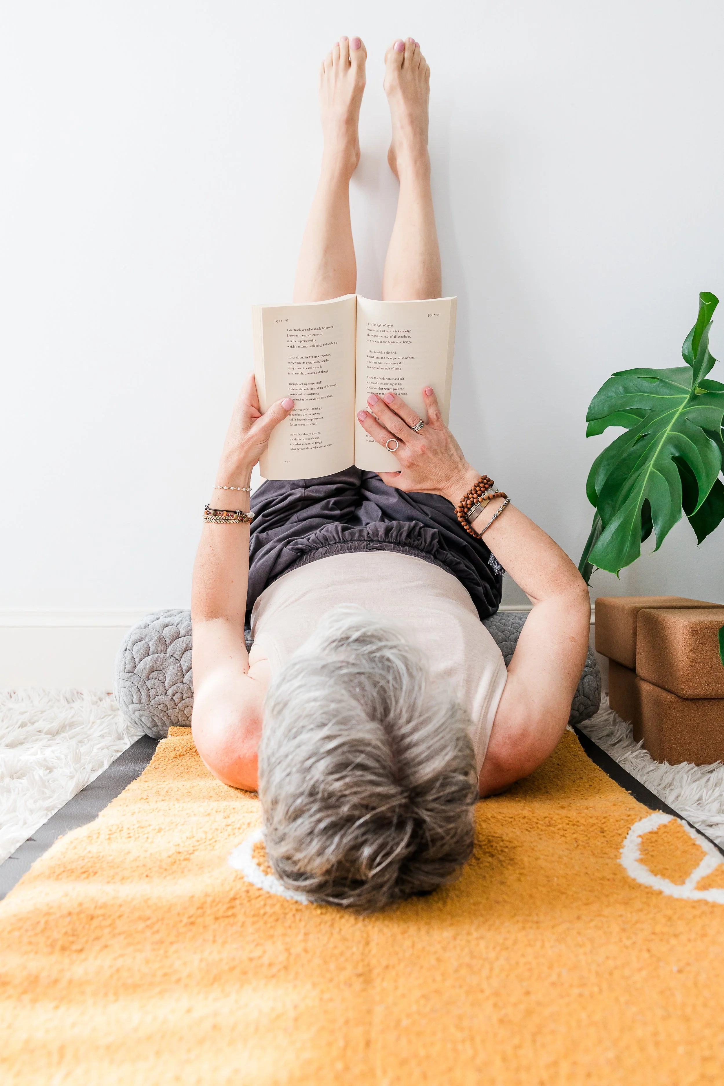 Heather Hatcher practicing restorative yoga, serving Charlotte, Wilmington, and Winston-Salem, North Carolina.