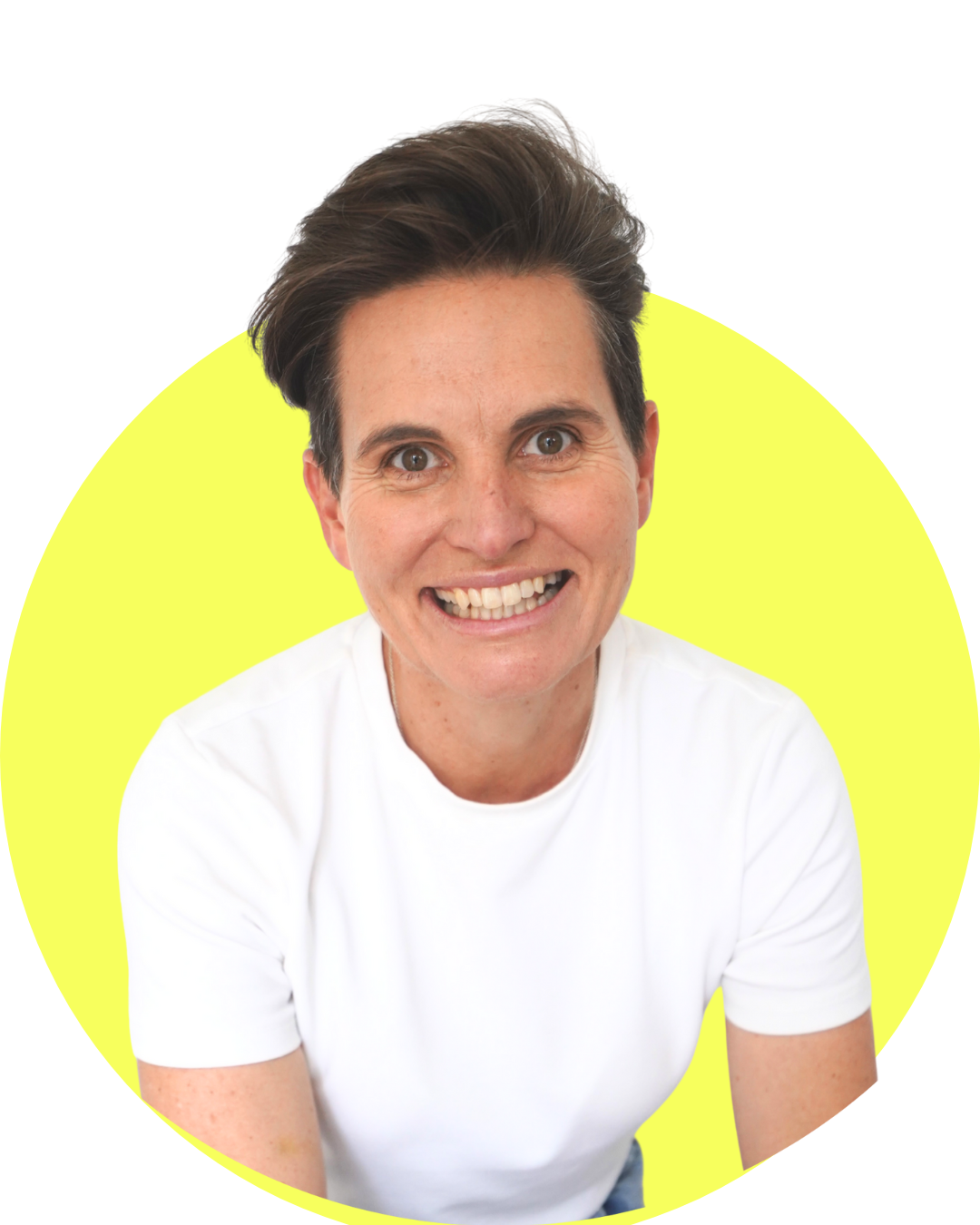 Smiling woman with short dark hair wearing a white t-shirt, with a bright yellow circle background.