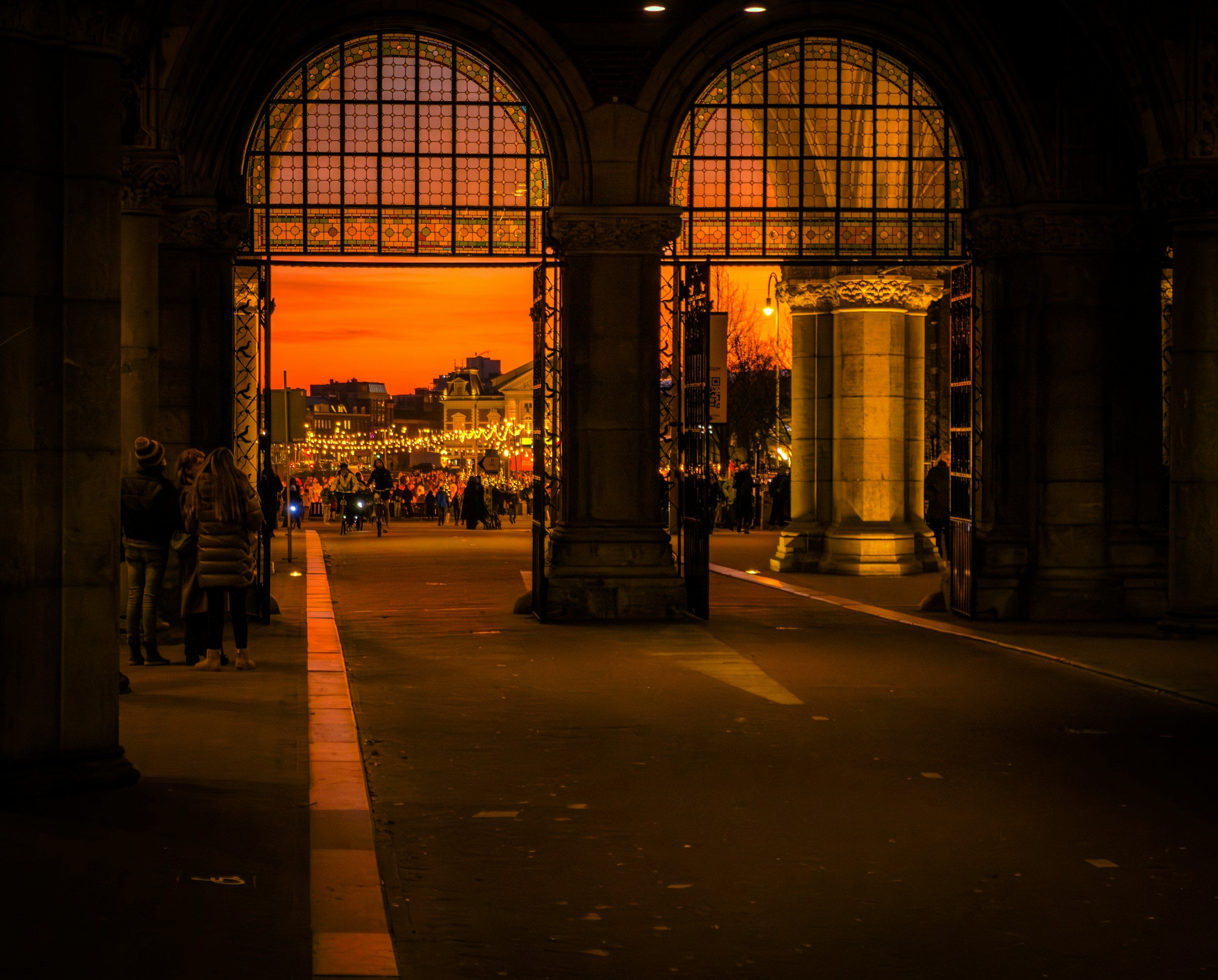 Sunset under arches of Rijksmuseum overlooking museumsqaure