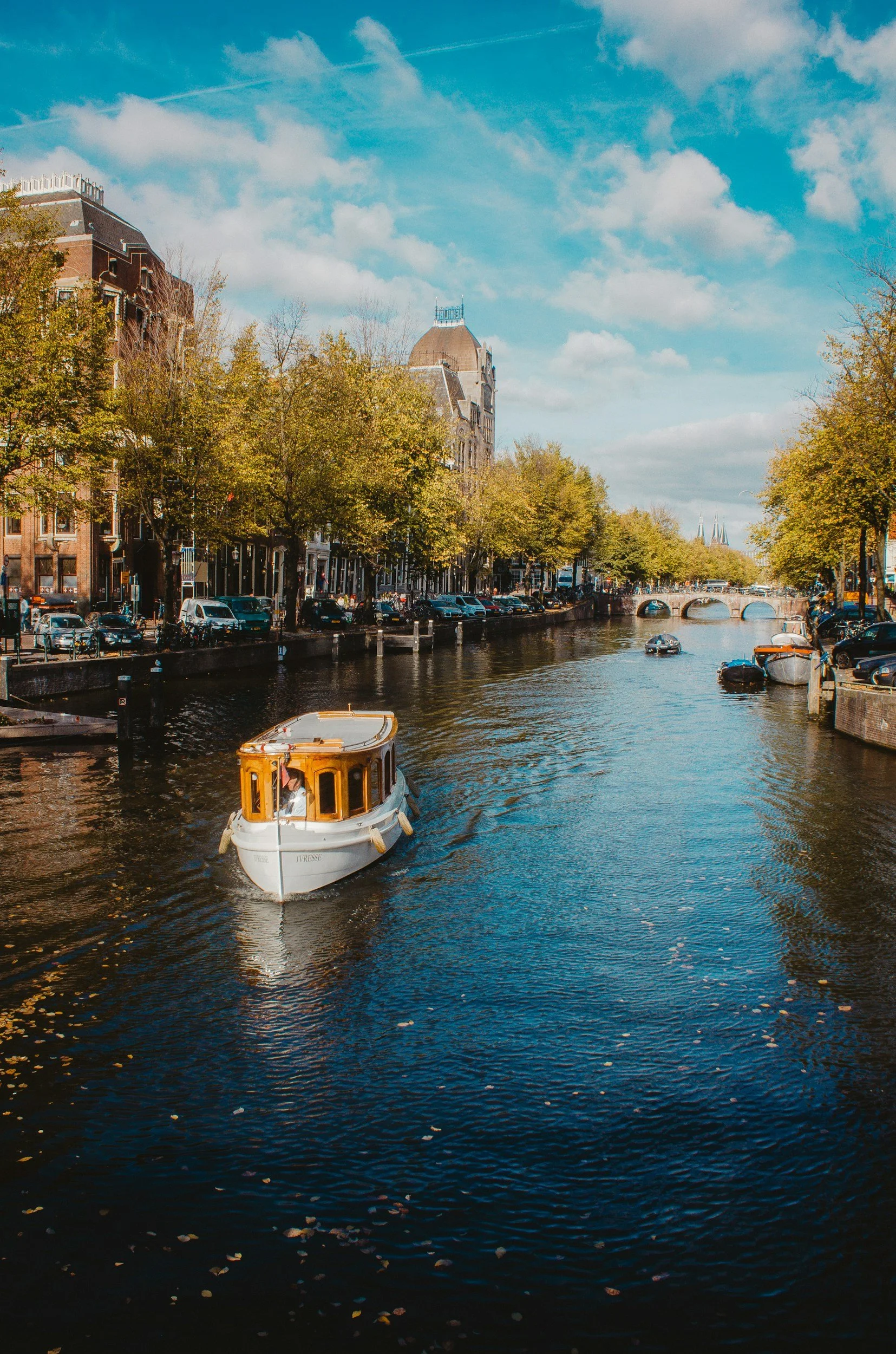 boat on canal amsterdam