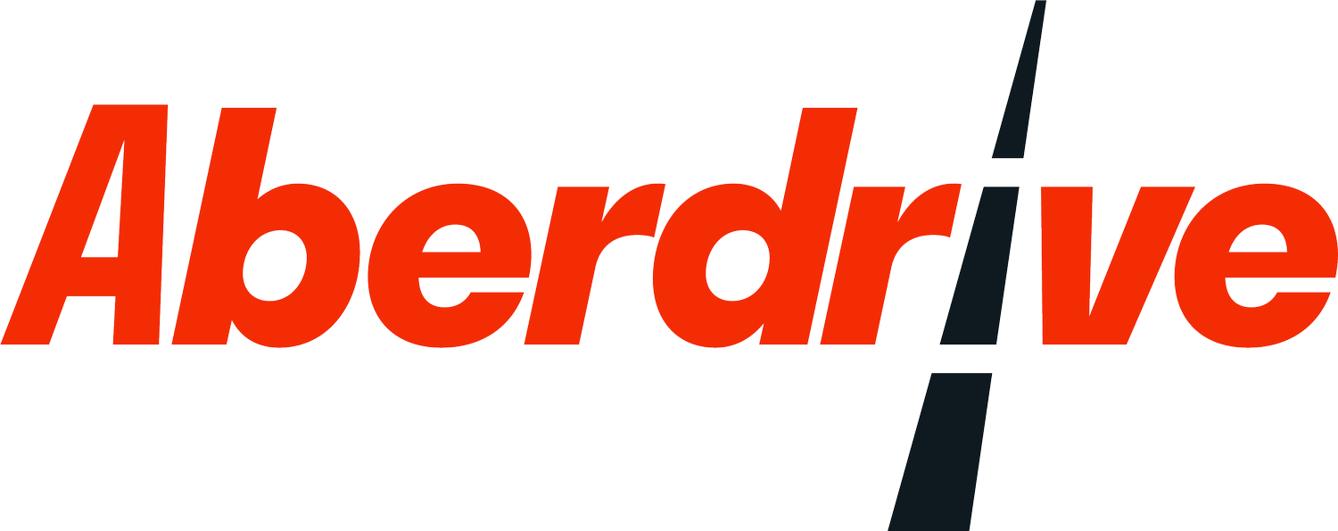 The logo for Aberdrive featuring the company name in red and black text with a stylized apex in black and gray.