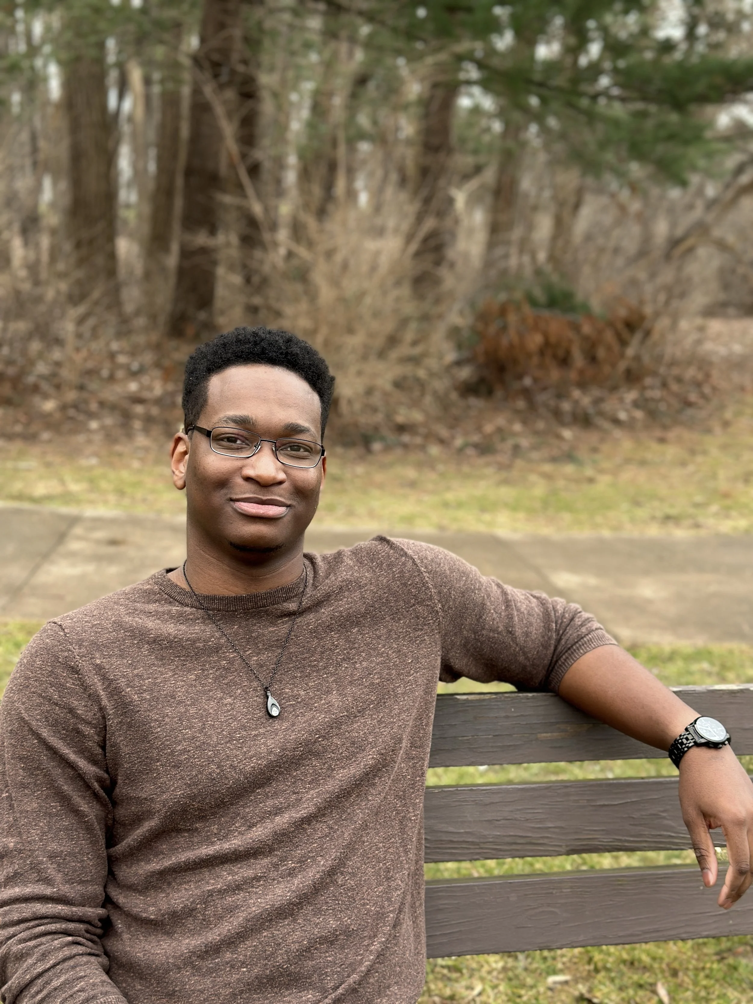 Headshot of the founder of Diverse & Thriving Counseling, a Black male therapist in Ohio specializing in virtual EMDR for trauma, BIPOC, LGBTQIA+, and neurodiverse clients.