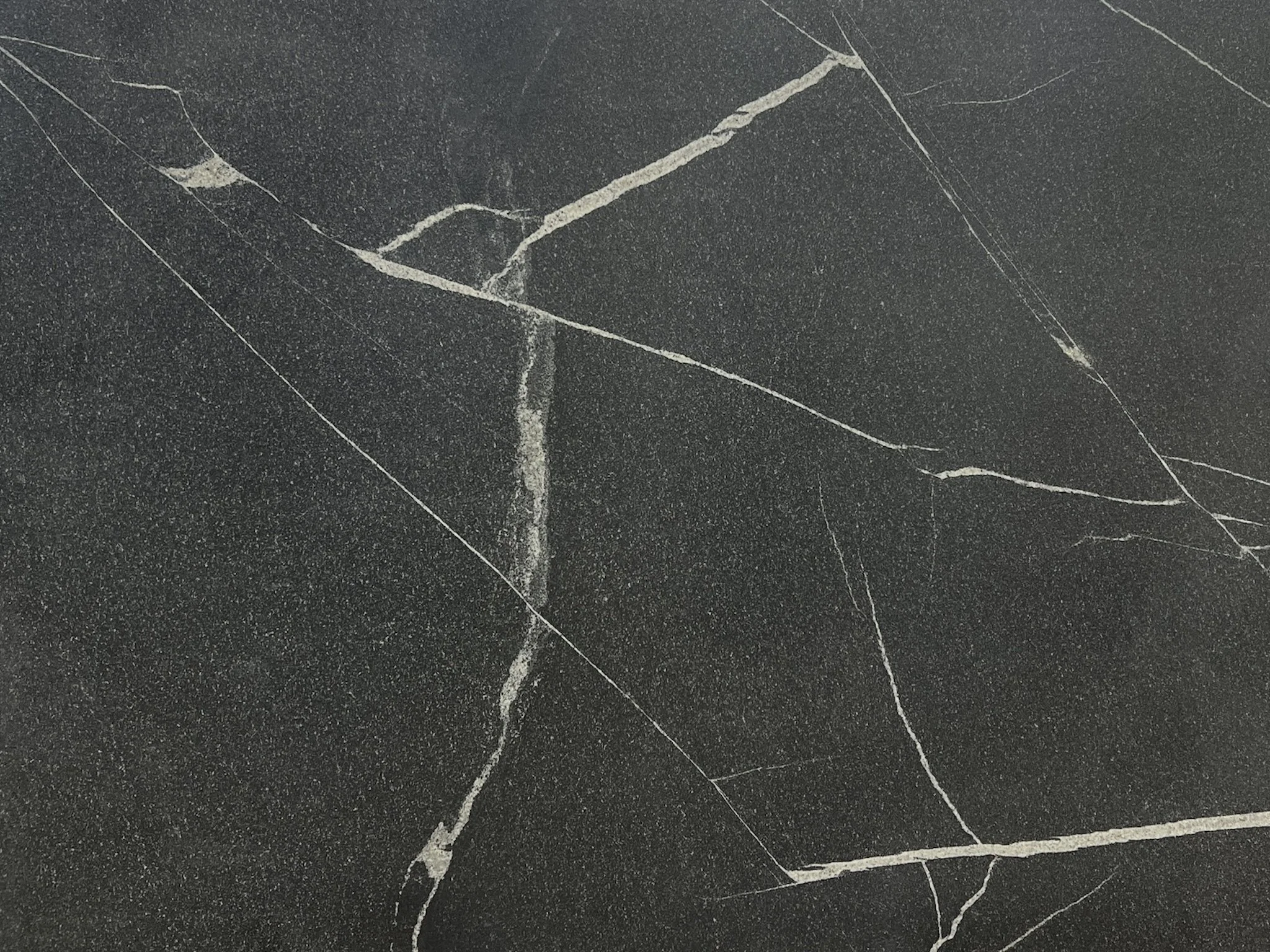 Granite - Vincent Black - Leathered Honed.jpeg