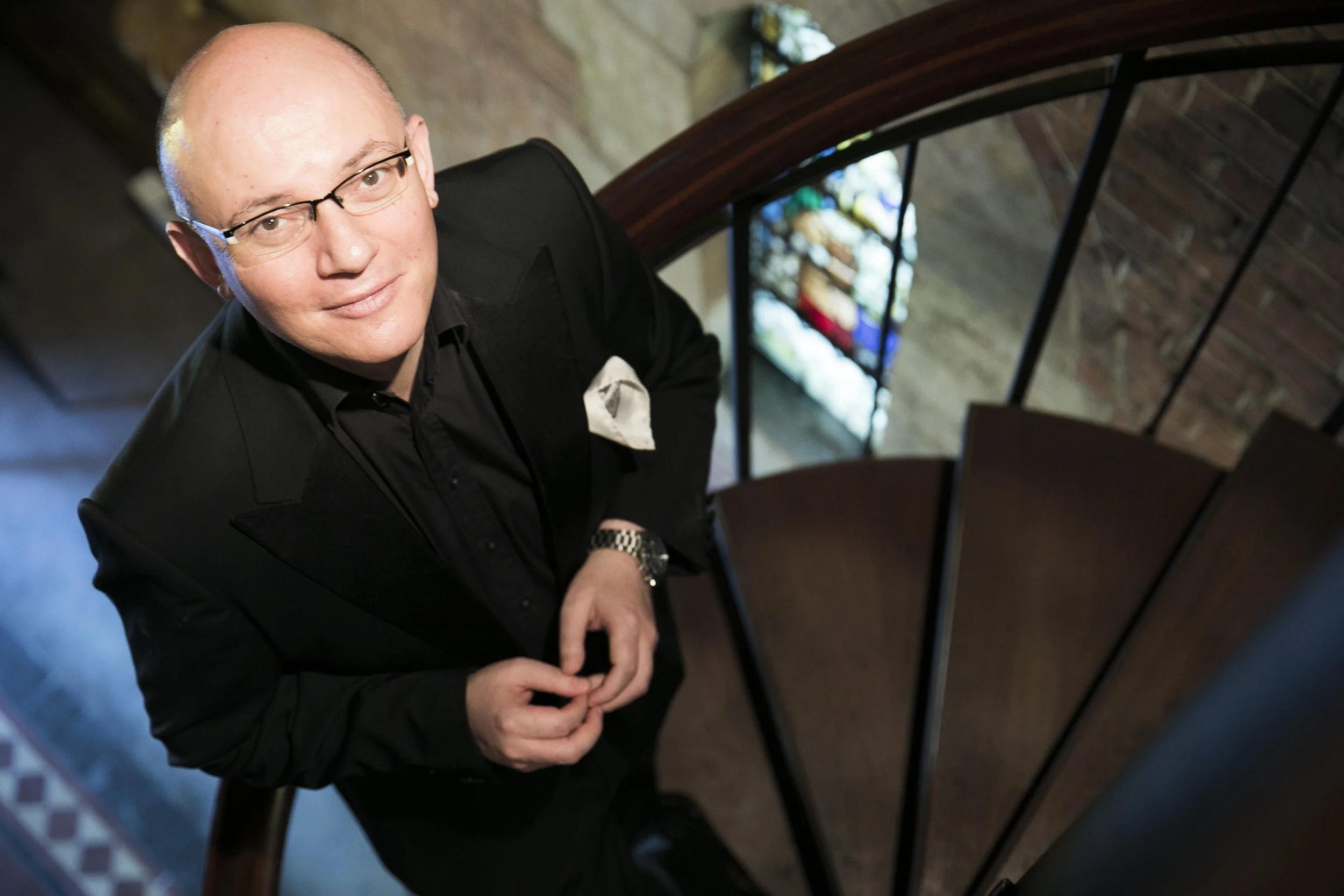 Joseph Nolan looking up staircase