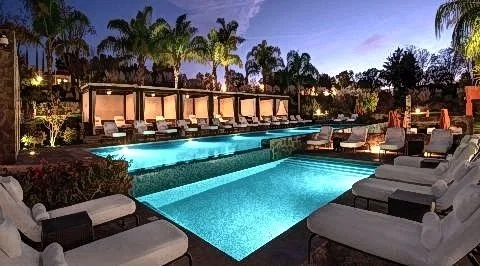 The Rosewood hotel pool with palm trees and sun lounger in San Miguel de Allende Mexico where Stems for Life is doing stem cell therapy