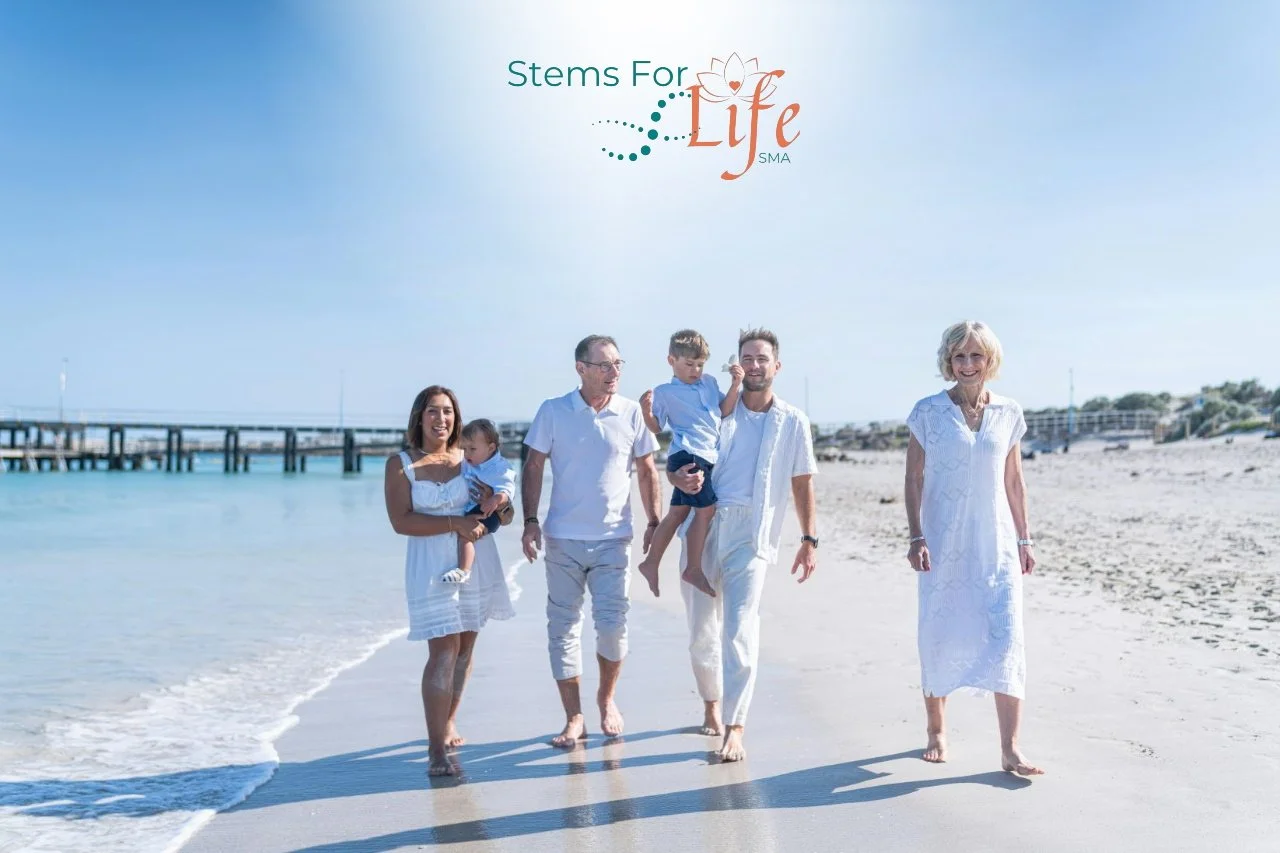 multi-generational-families-walking-at-beach-stems-for-life-logo
