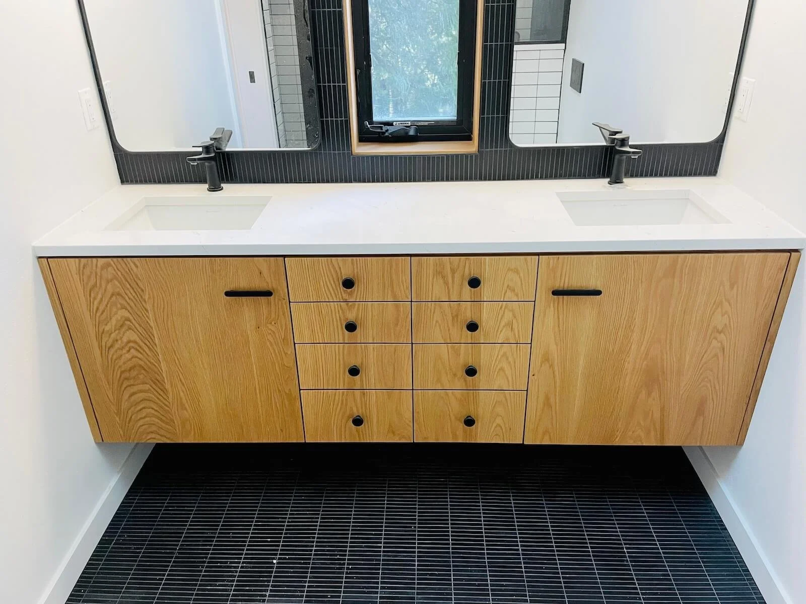 Solid white oak bathroom vanity, continuous grain, tile backsplash