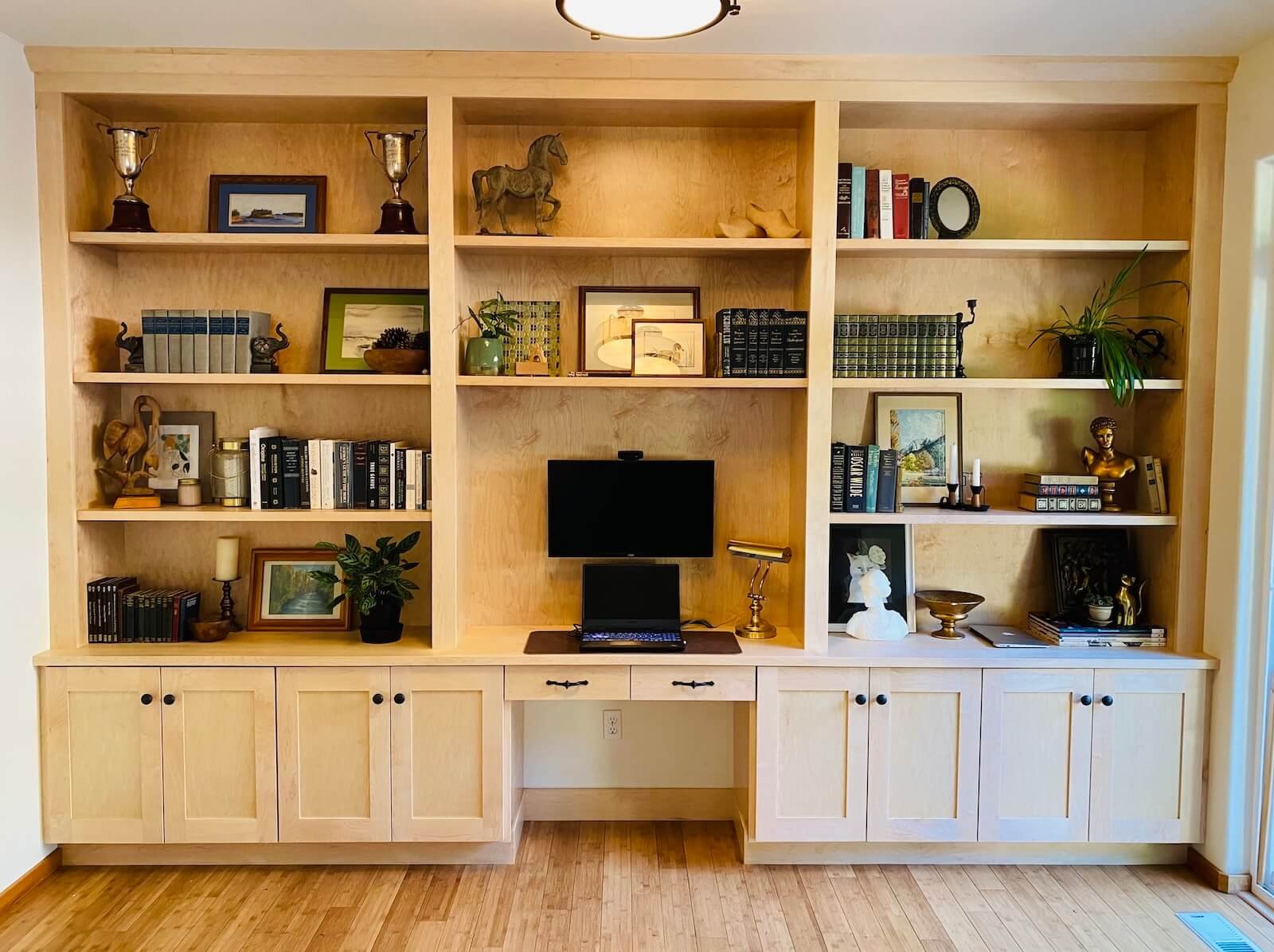 Solid maple built-in cabinets with desk and storage, remodel