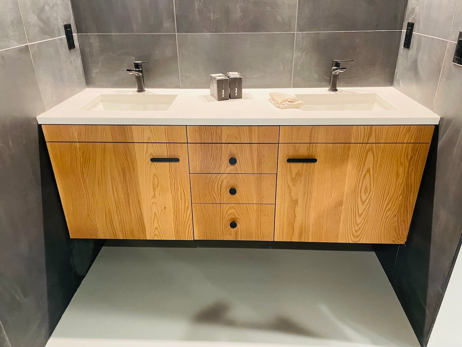 Solid oak bathroom vanity, continuous grain fronts, dual sink
