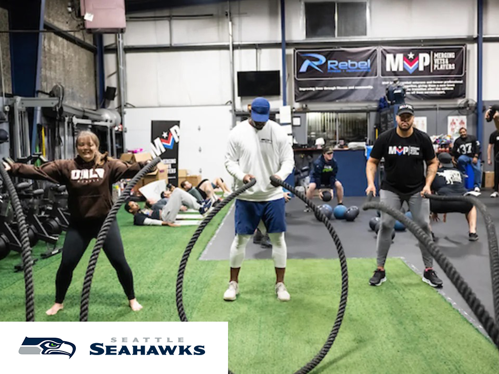 Seahawks Team Up With "MVP - Merging Vets And Players" For A Holiday Huddle And Workout