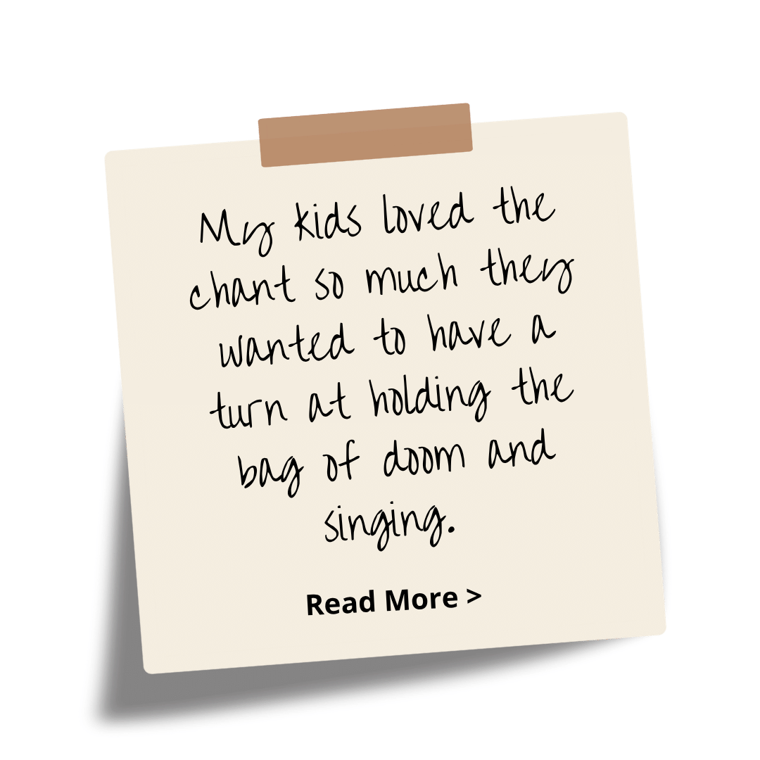 A handwritten note on a piece of paper taped to a black background. The note reads: 'My kids loved the chant so much they wanted to have a turn at holding the bag of doom and singing.'