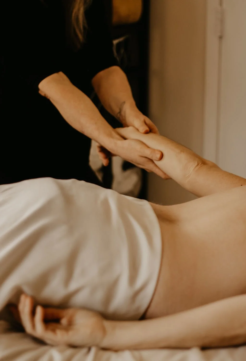 Woman receiving an arm massage