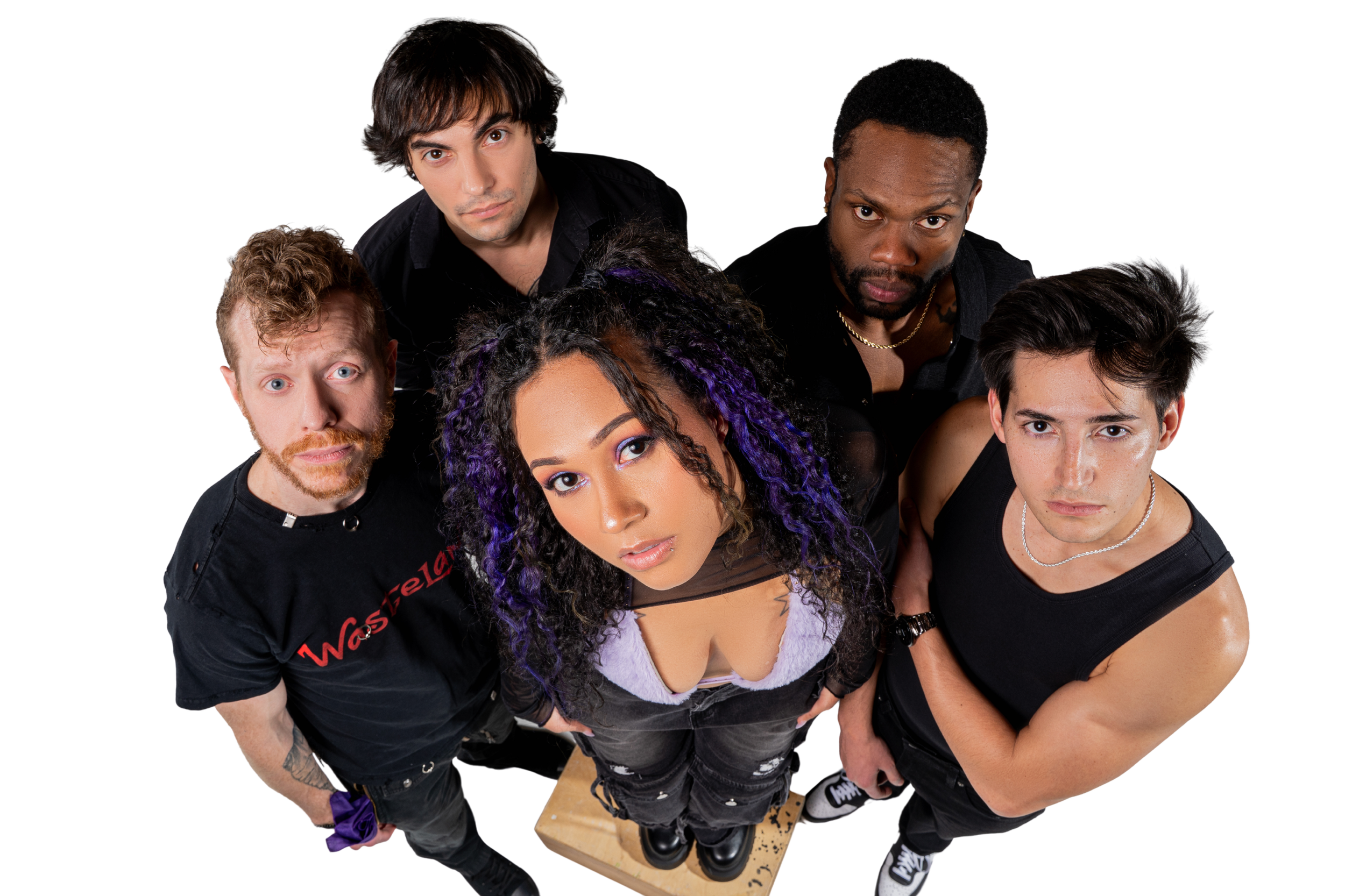 A diverse group of six young adults looking up at the camera, with one woman in the center and five men surrounding her, against a black background.
