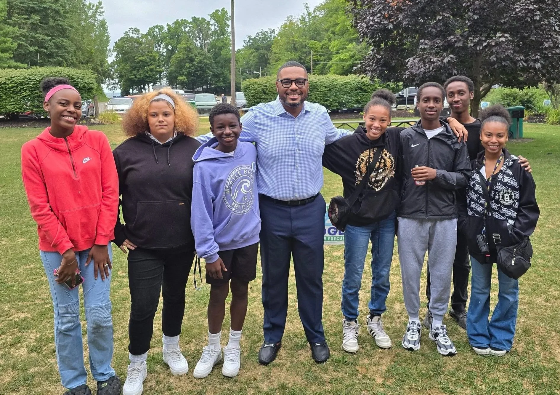 Group of high school aged students with PA Lt. Governor Austin Davis in the middle.