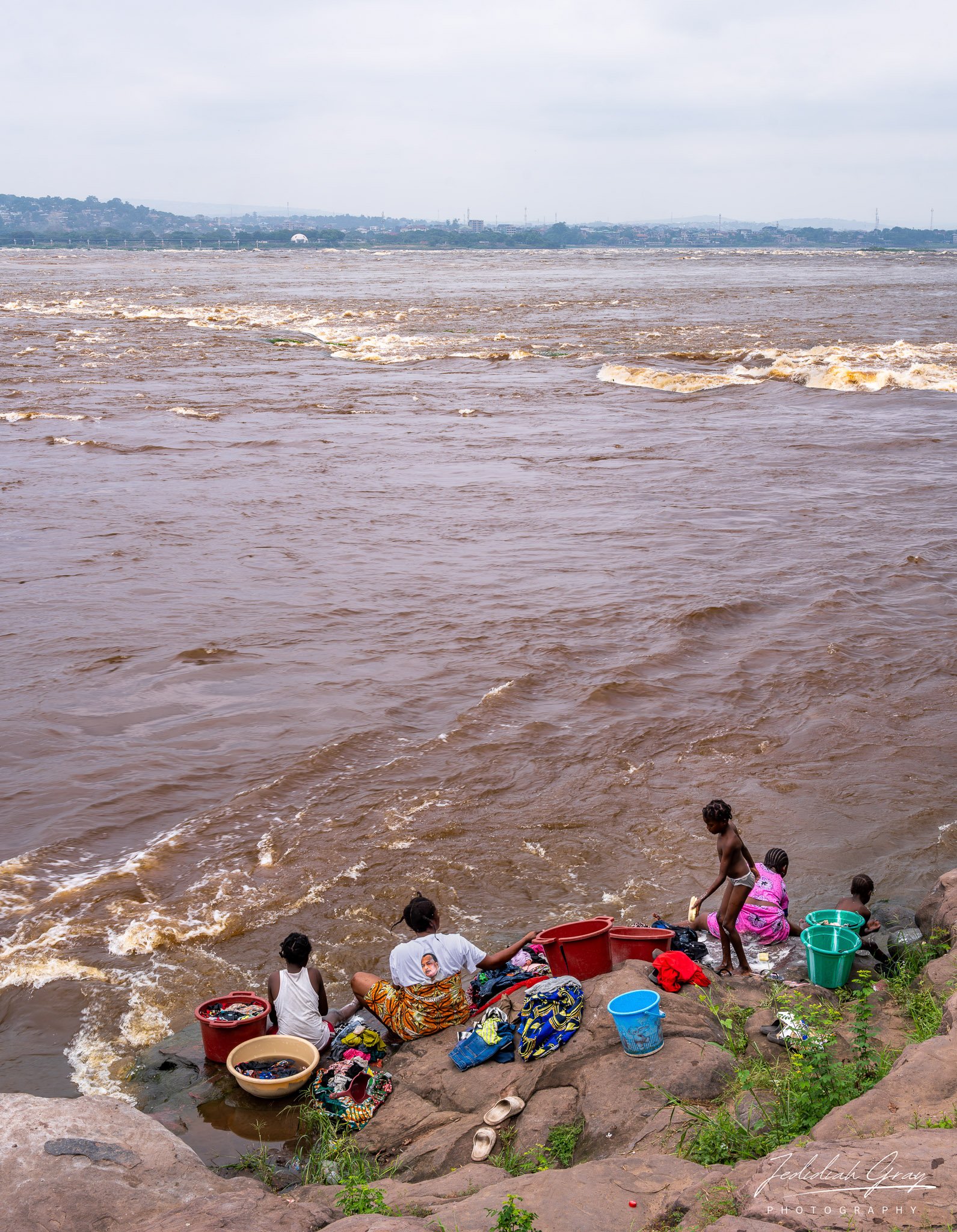 Locals washing clothes in the Congo River, Brazzaville