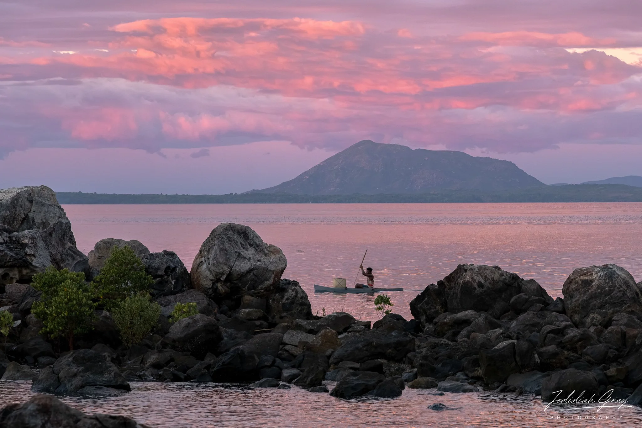A fisherman in his traditional pirogue 
