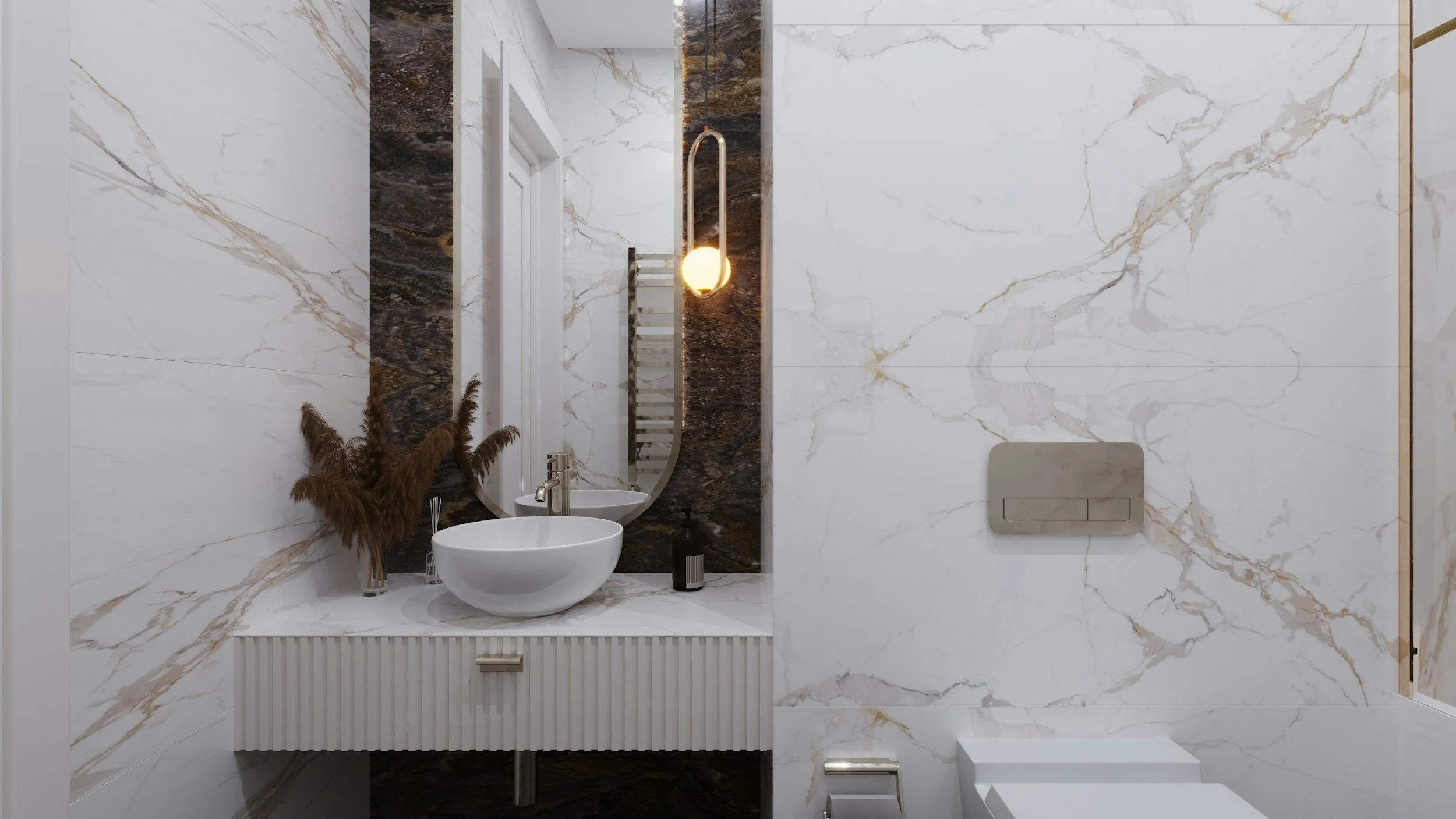 Modern bathroom with white marble walls with gold veins, a white bowl sink on a textured white vanity, a large curved mirror, a decorative vase with pampas grass, a black soap dispenser, a hanging light fixture, a wall-mounted toilet, and a towel radiator.