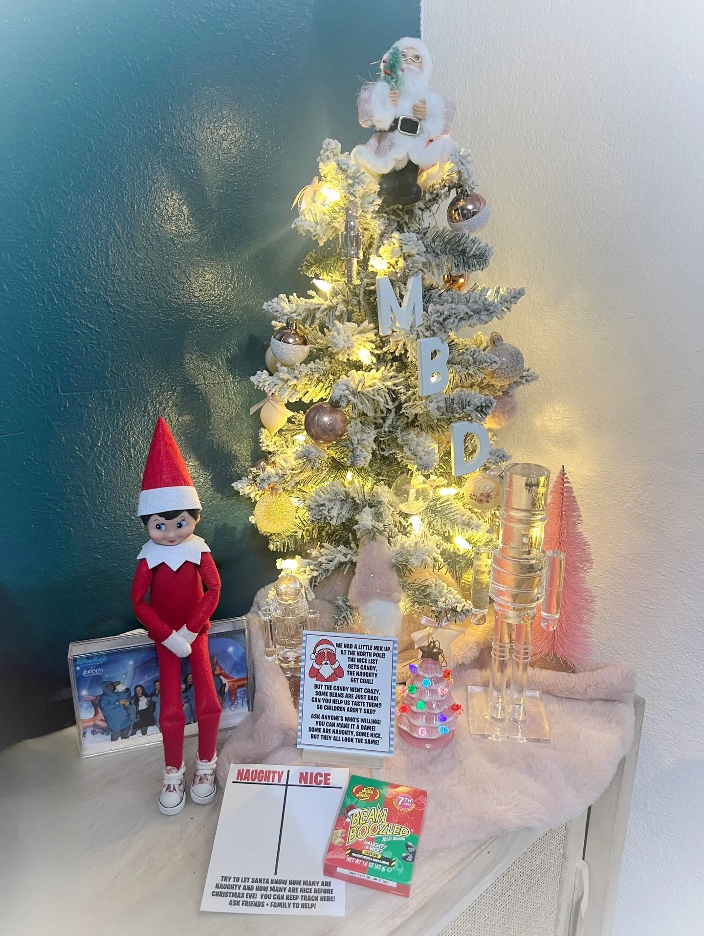 This might look cute, but it was GROSS!!!! Apparently Santa mixed up the good jelly beans with the bad and it was a game for Marek (and her parents) to help sort them out. Of course, Marek got a &ldquo;good one.&rdquo; Dylan got &ldquo;wet dog&rdquo;