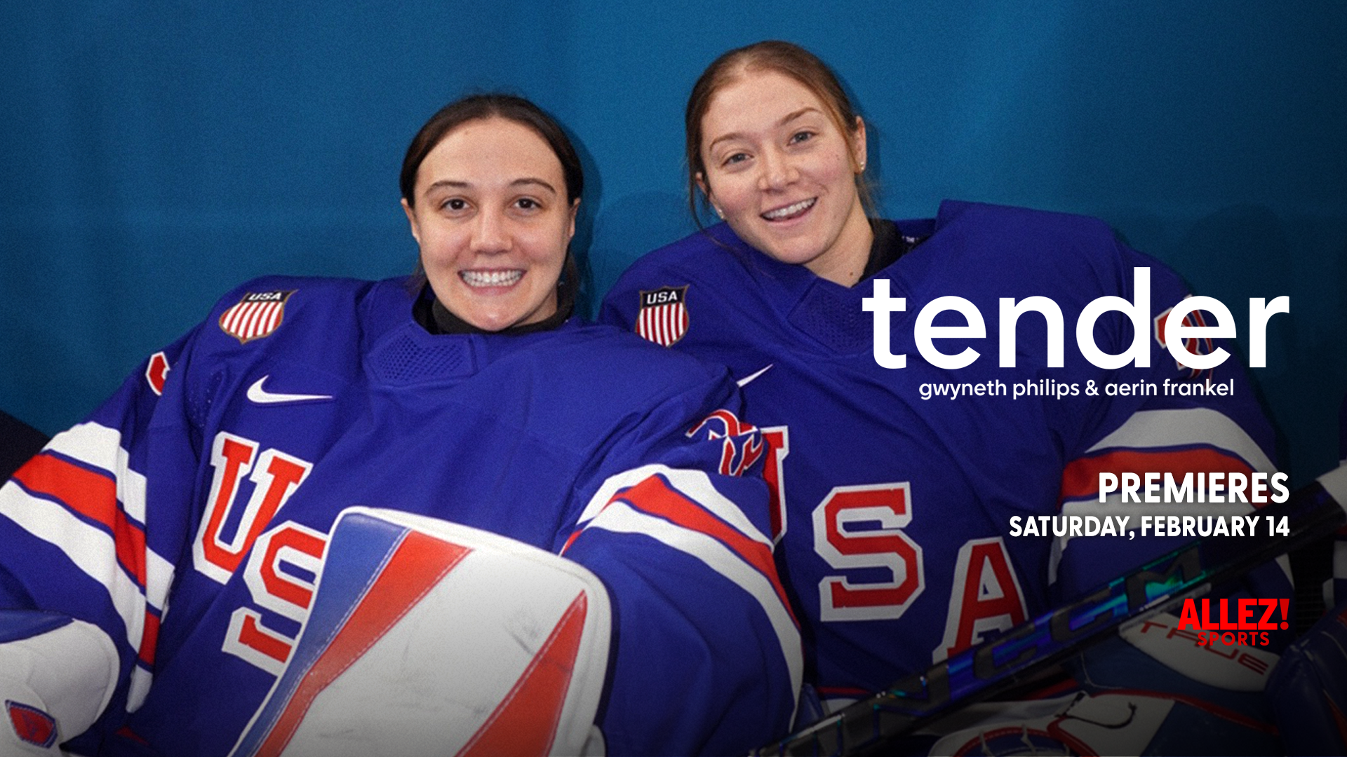 Two female hockey players wearing Team USA blue jerseys sit together against a blue background, smiling at the camera. The player on the left wears number 17, and the player on the right wears number 5. Both jerseys feature the USA Hockey logo with A