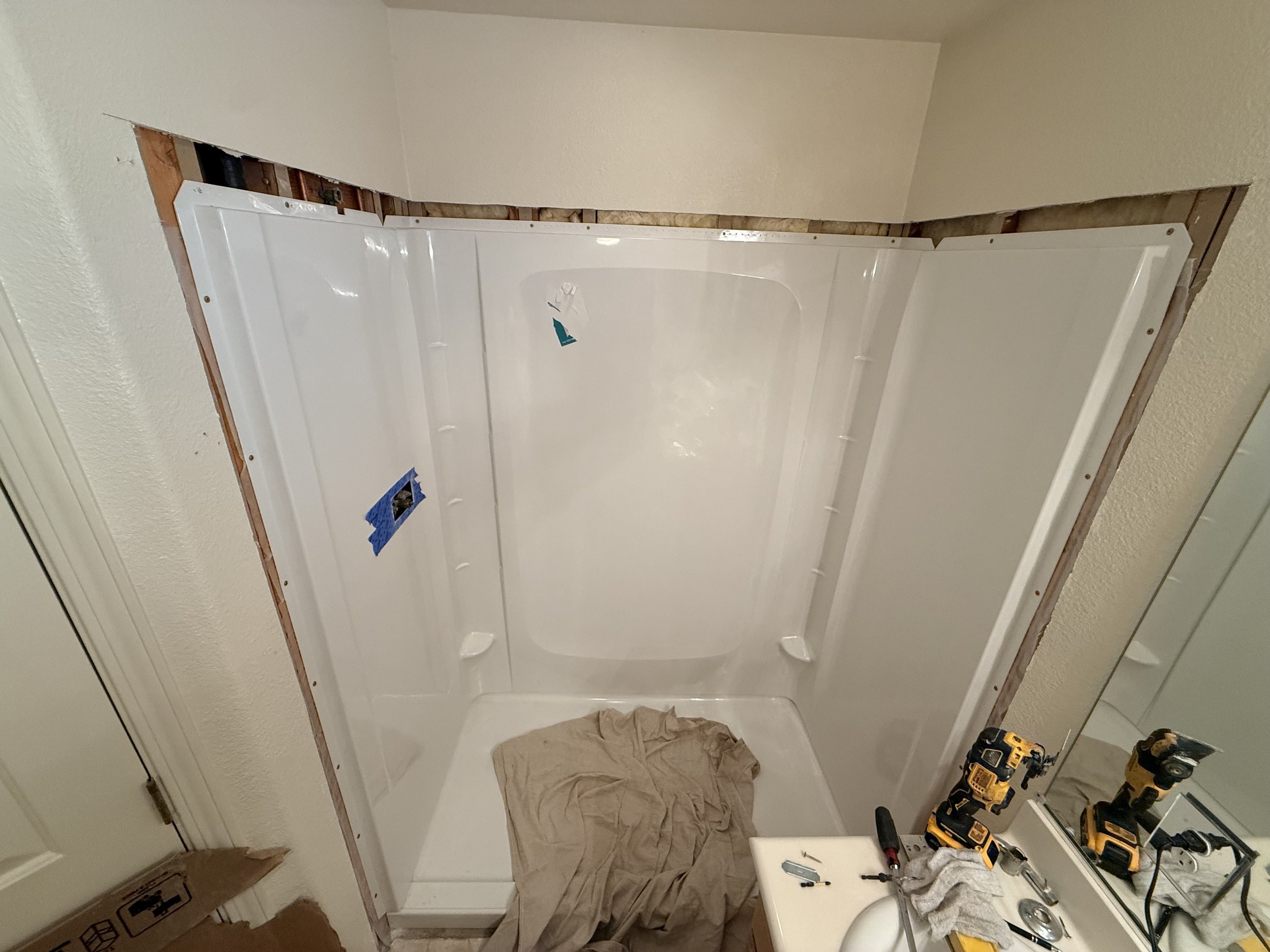 Shower Renovation 6 - New system installed with a vapor barrier behind it