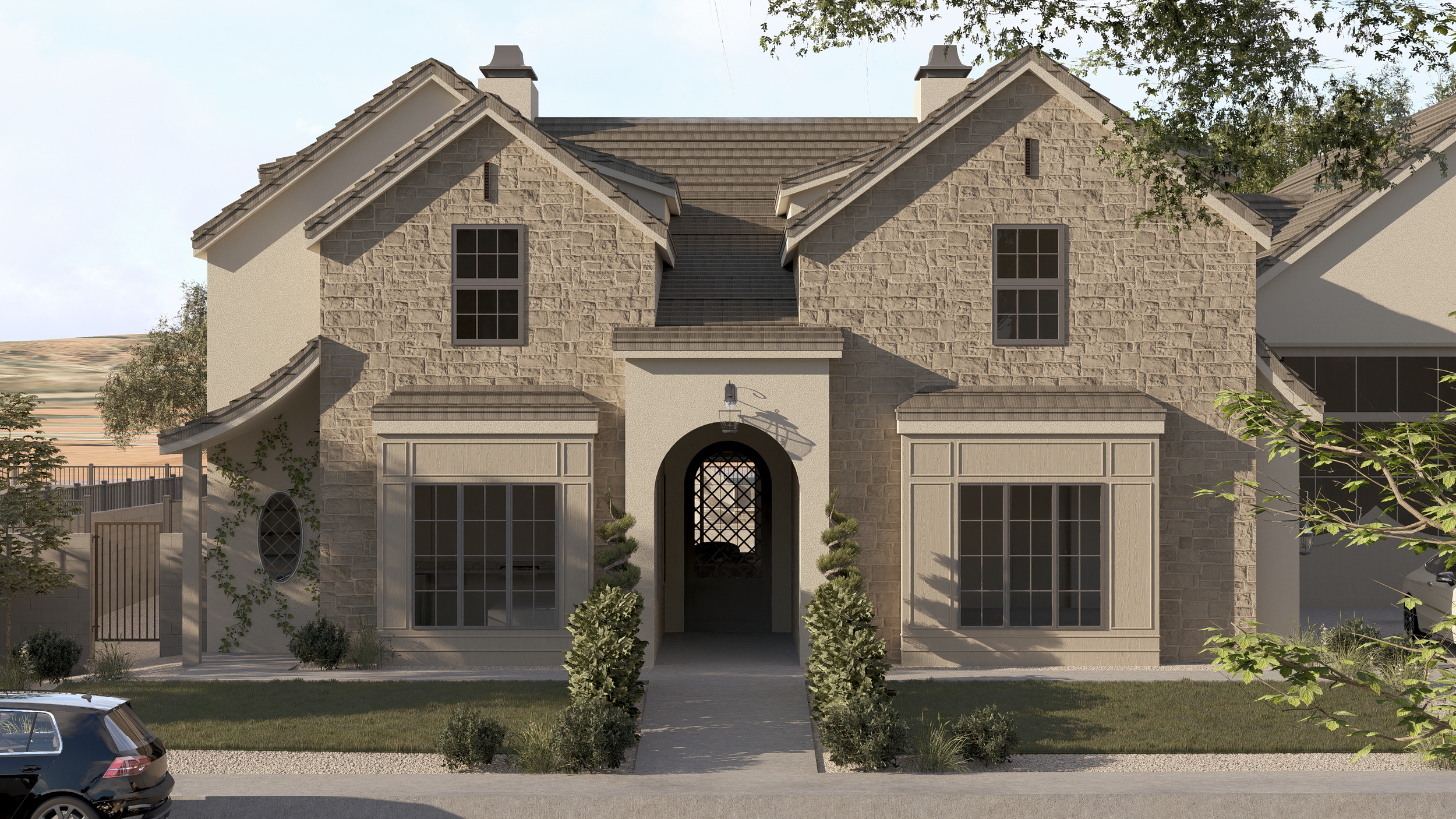 Front view of a modern two-story house with stone and stucco exterior, front entrance with archway, two large front windows, and a pathway with landscaped bushes leading to the door. There are trees and a car parked on the street.