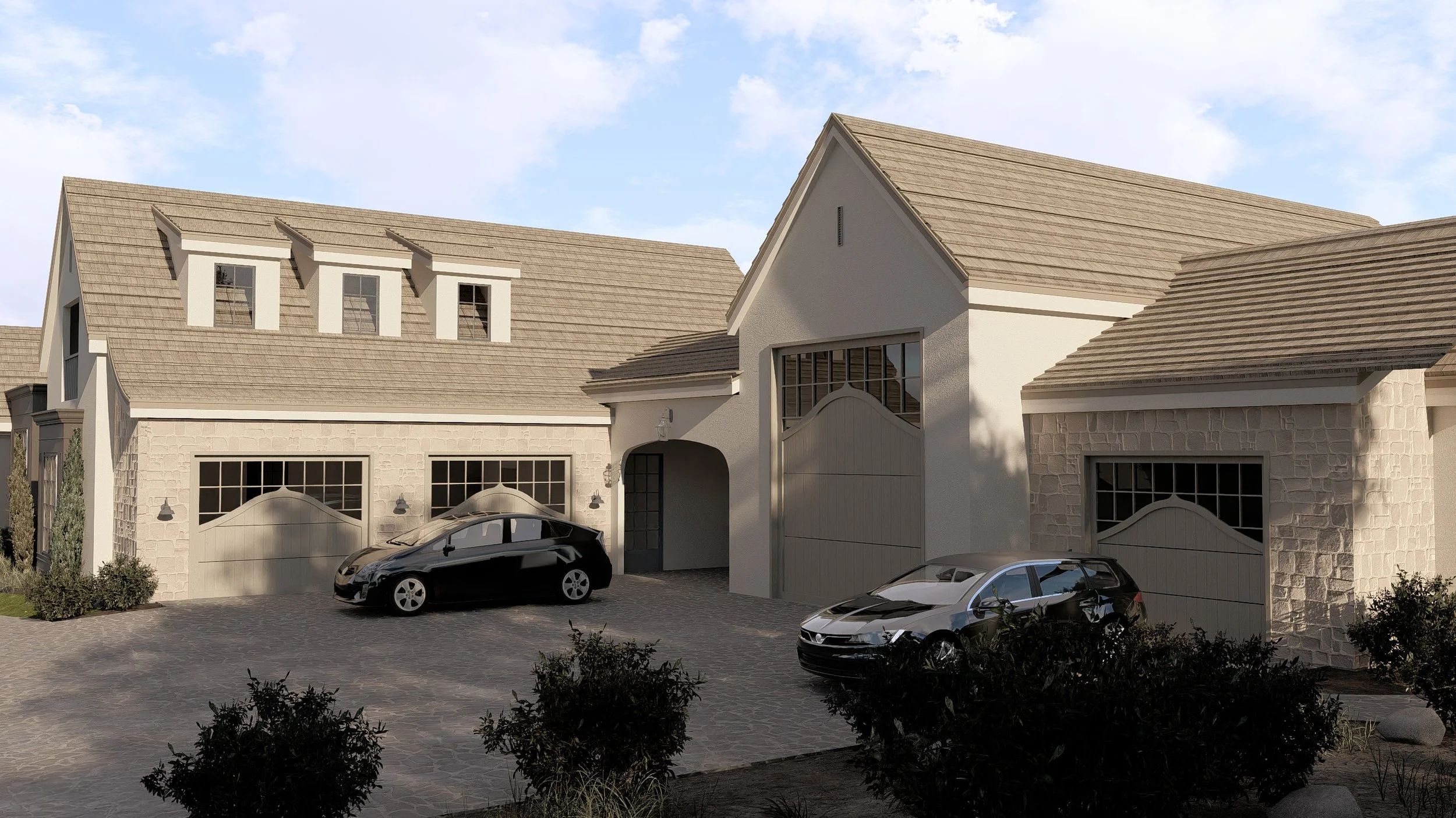 Front view of a modern house with two cars parked in the driveway, stone and stucco exterior, gable roofs, and landscaped bushes.