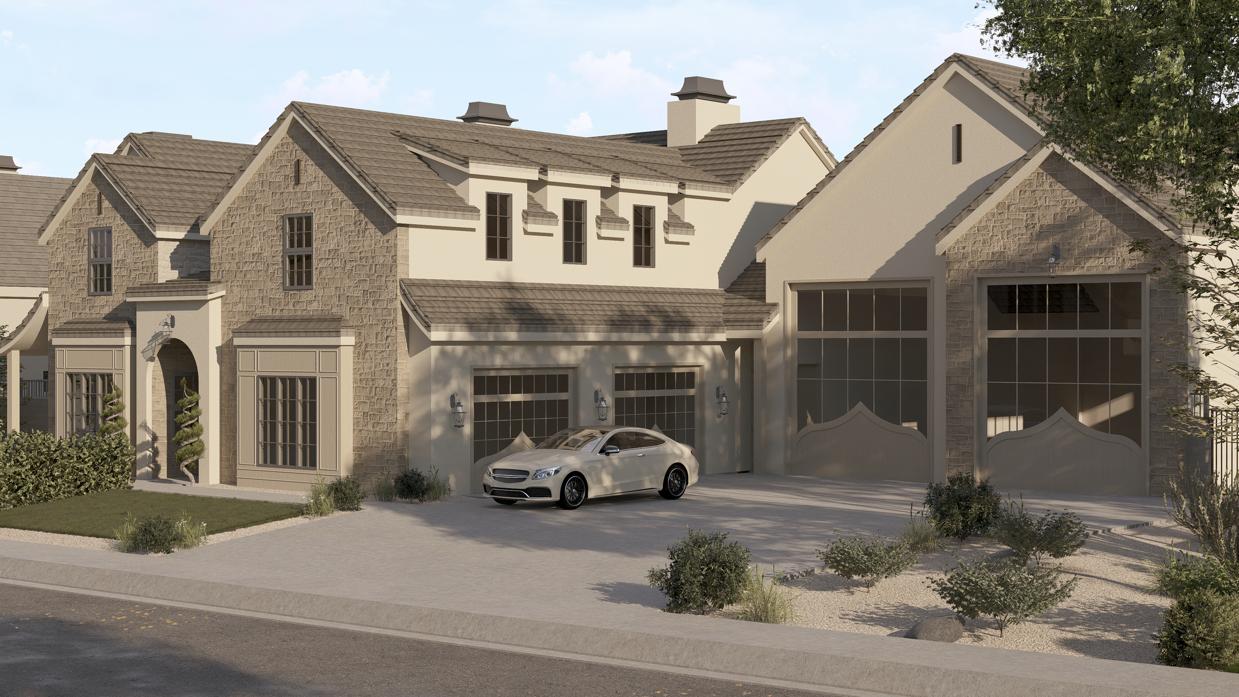 A modern two-story house with a beige stone and stucco exterior, a front driveway with a silver car, and desert landscaping with shrubs and rocks.