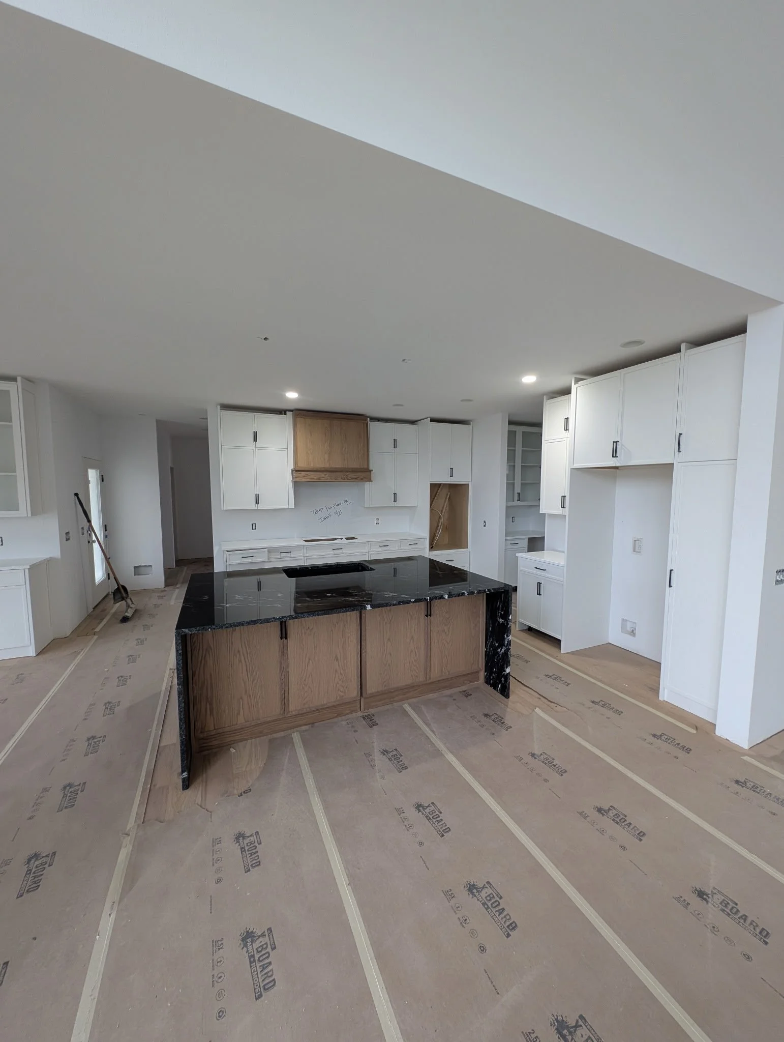 Unfinished kitchen before the digital enhancement by Blueprint Media 