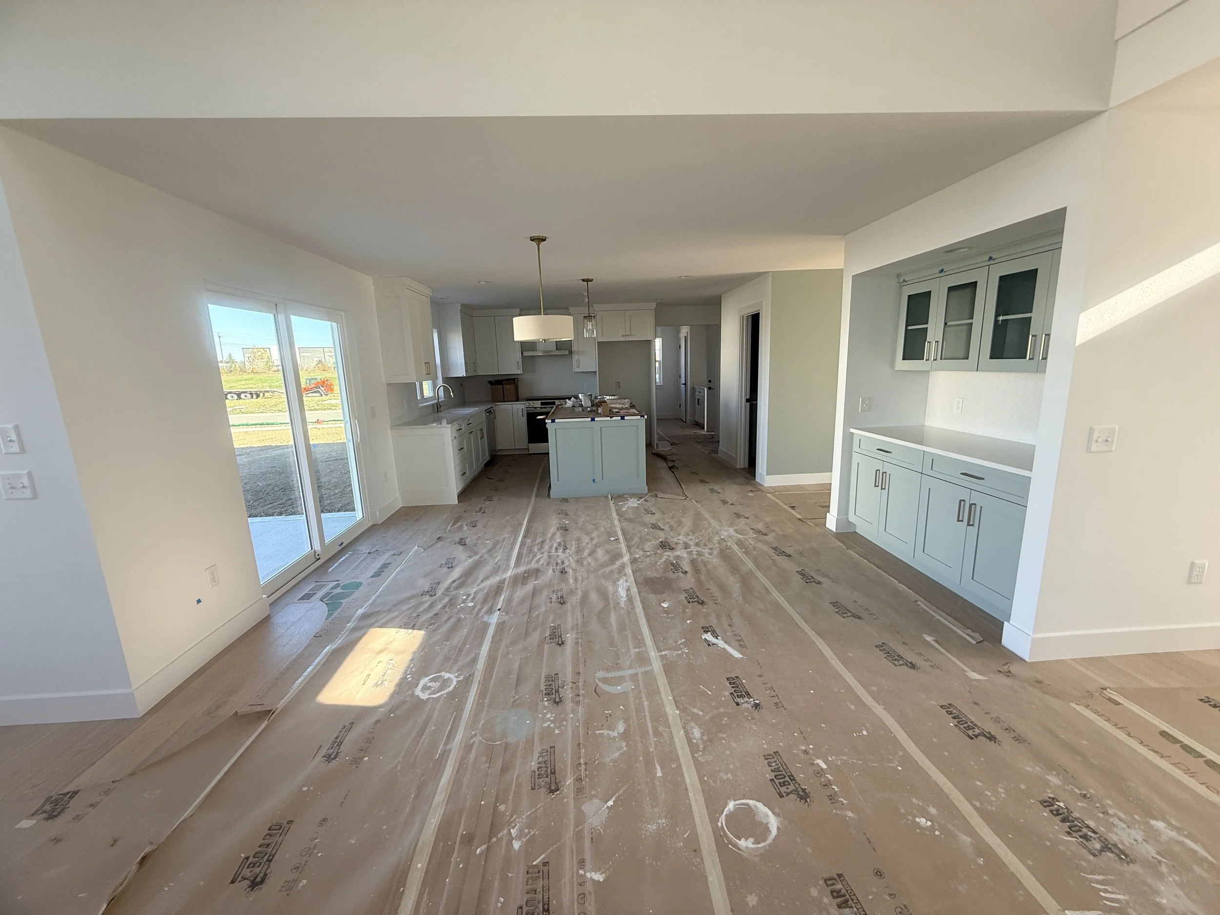 Before and after photo of under-construction home simulation.