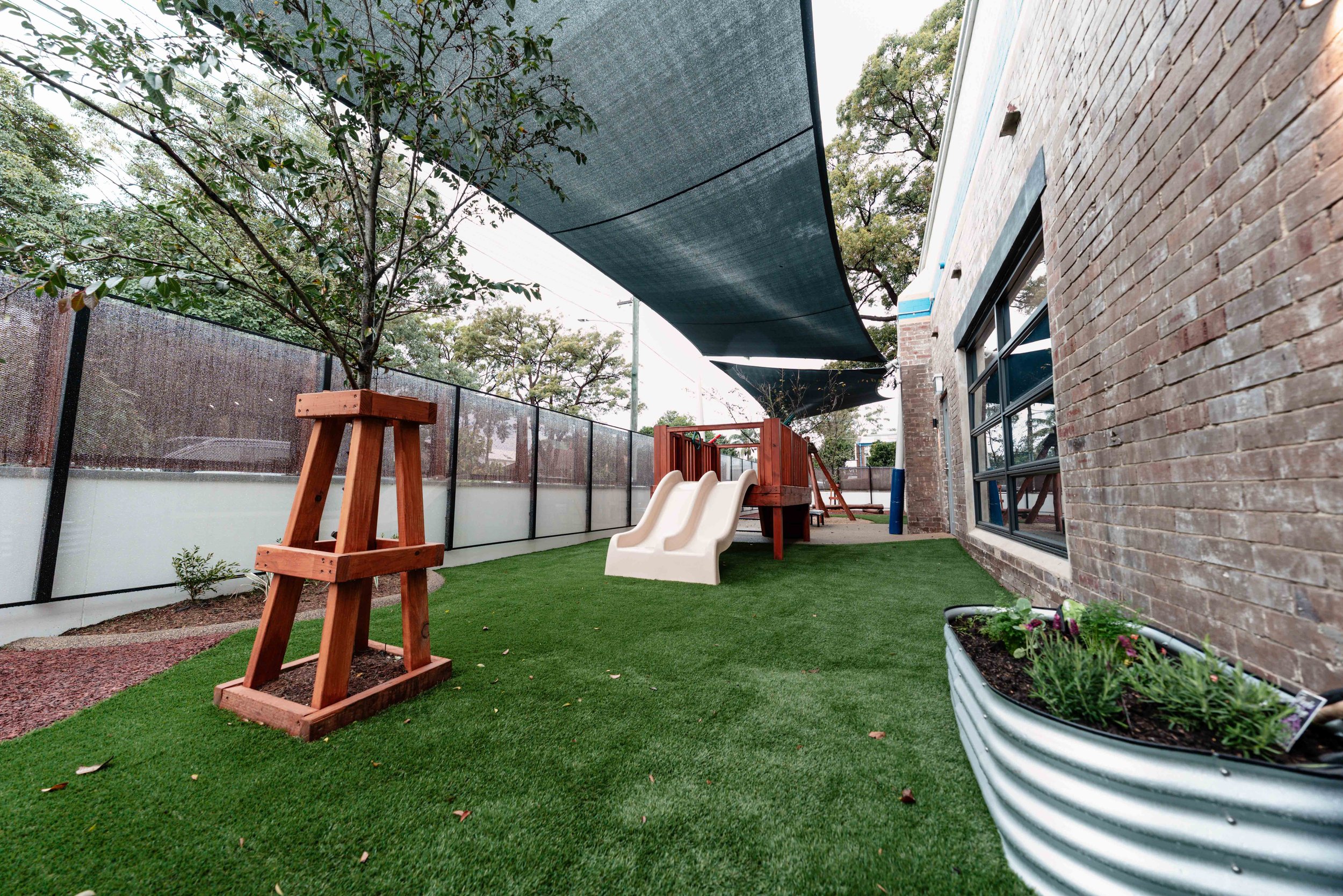 childcare slide and outdoor play area