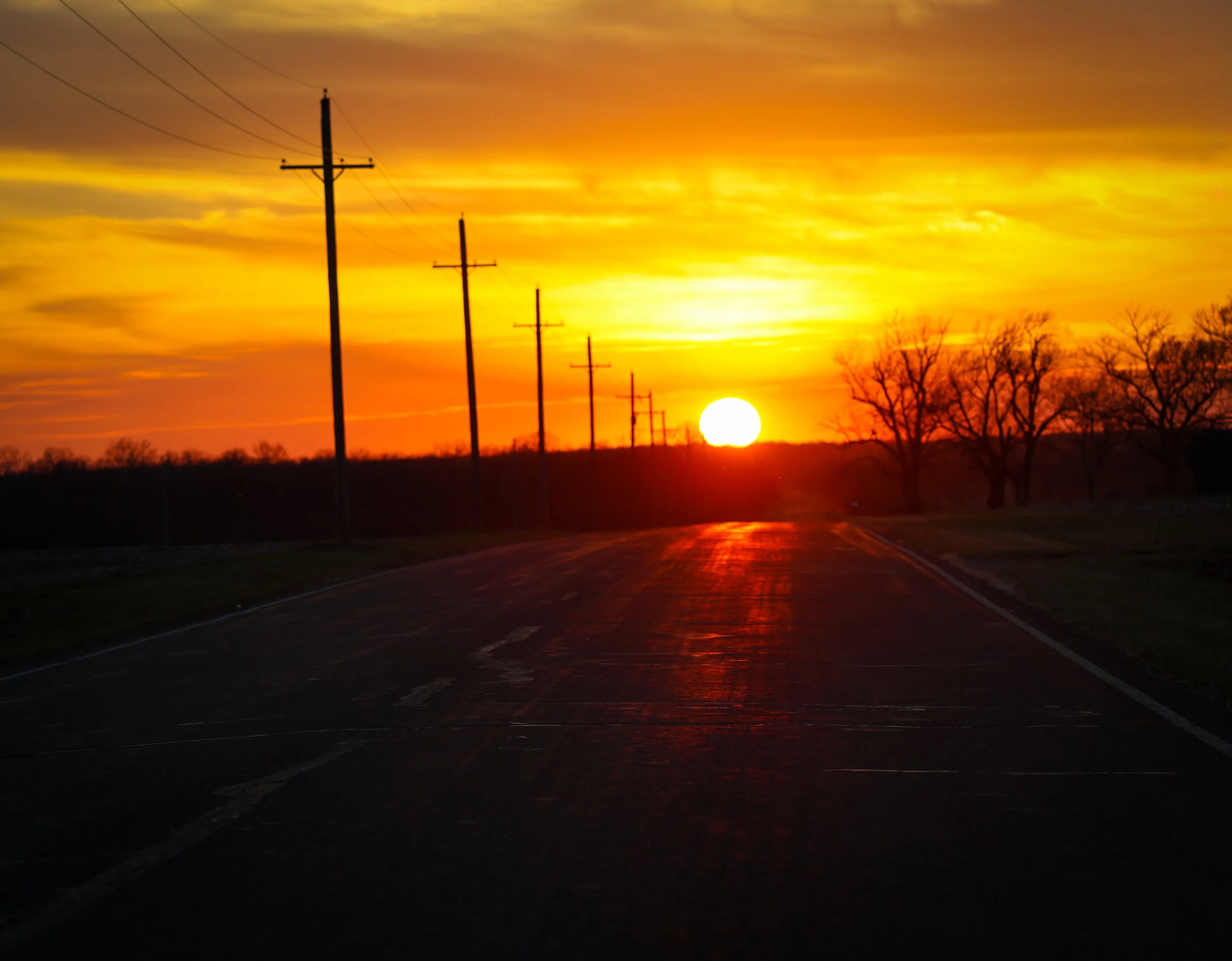 At sunset, the road felt like it was carrying the light home.
