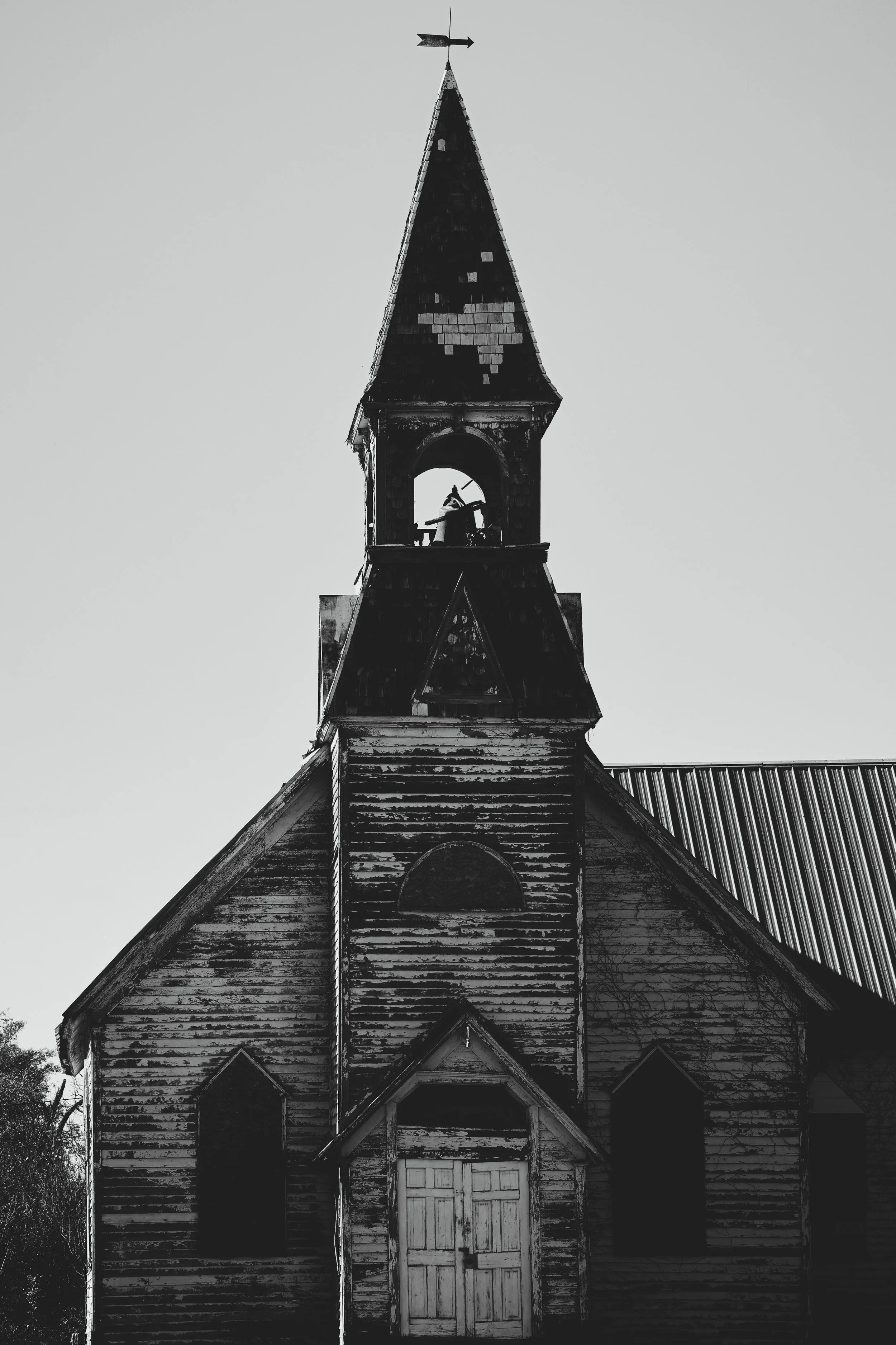 Even with peeling boards and age upon it, this old church still holds a solemn grace.
