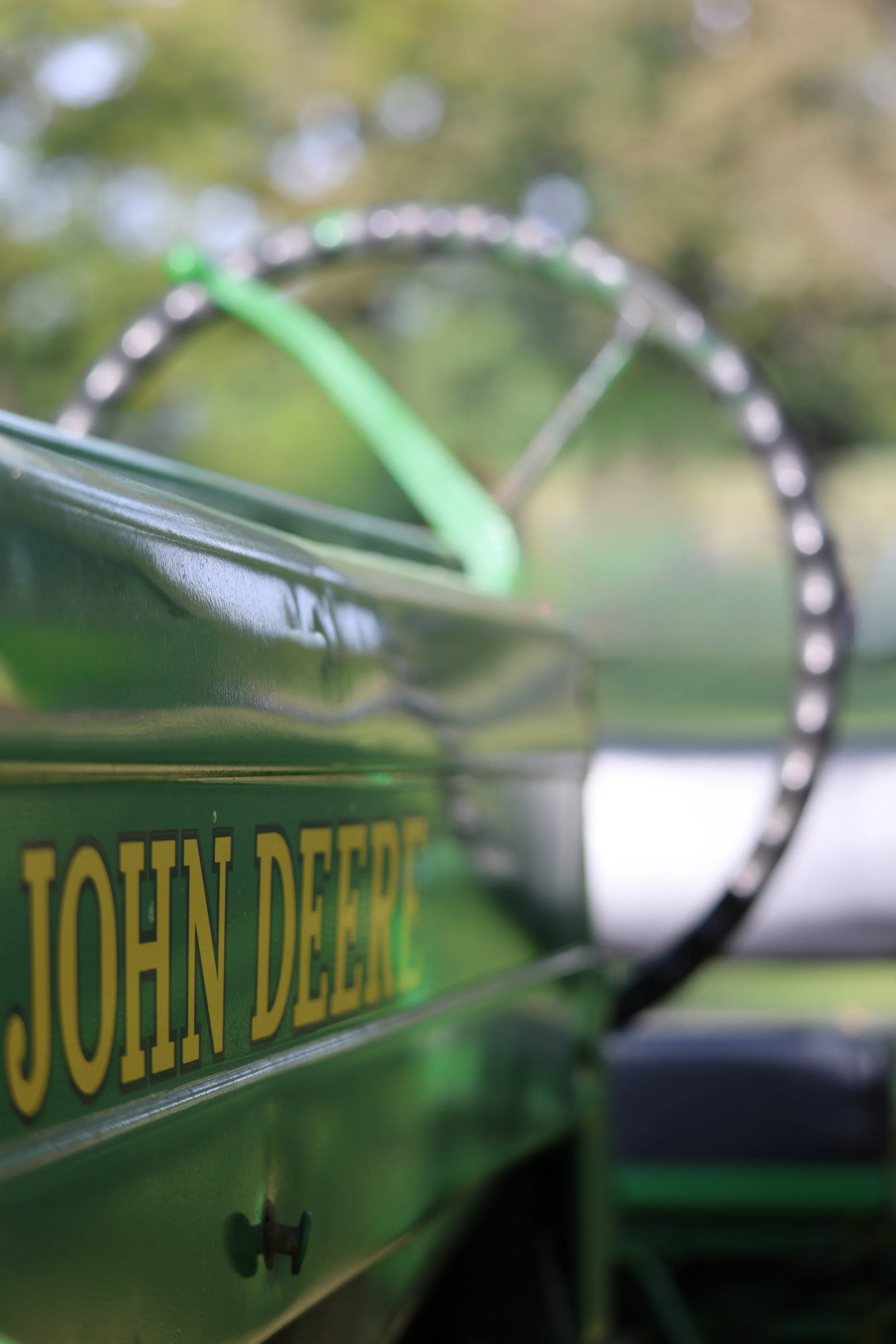 In this simple close-up, the John Deere feels both iconic and deeply rooted in the story of rural life.