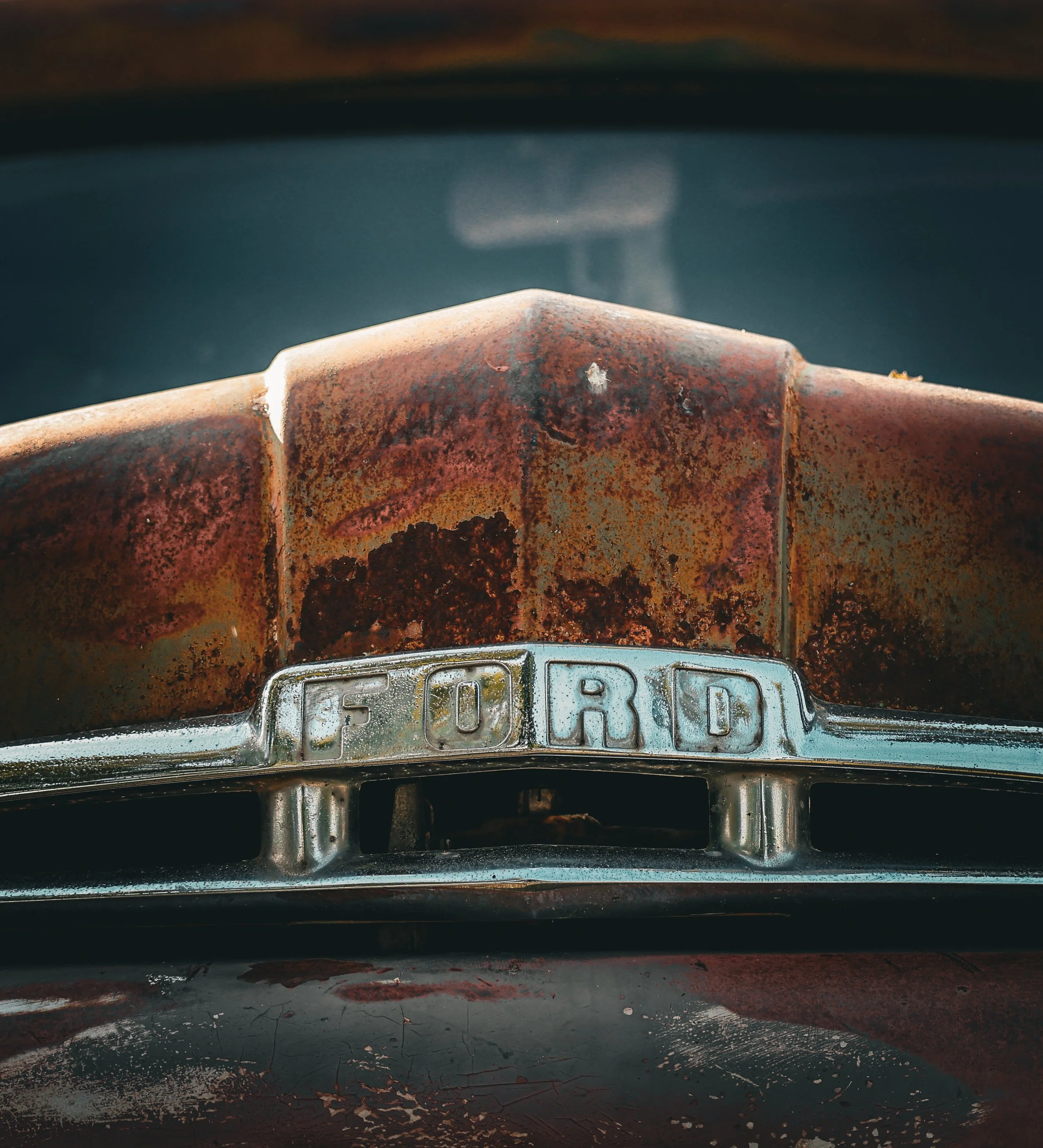 Time may have taken the paint, but the Ford name still shows up strong.