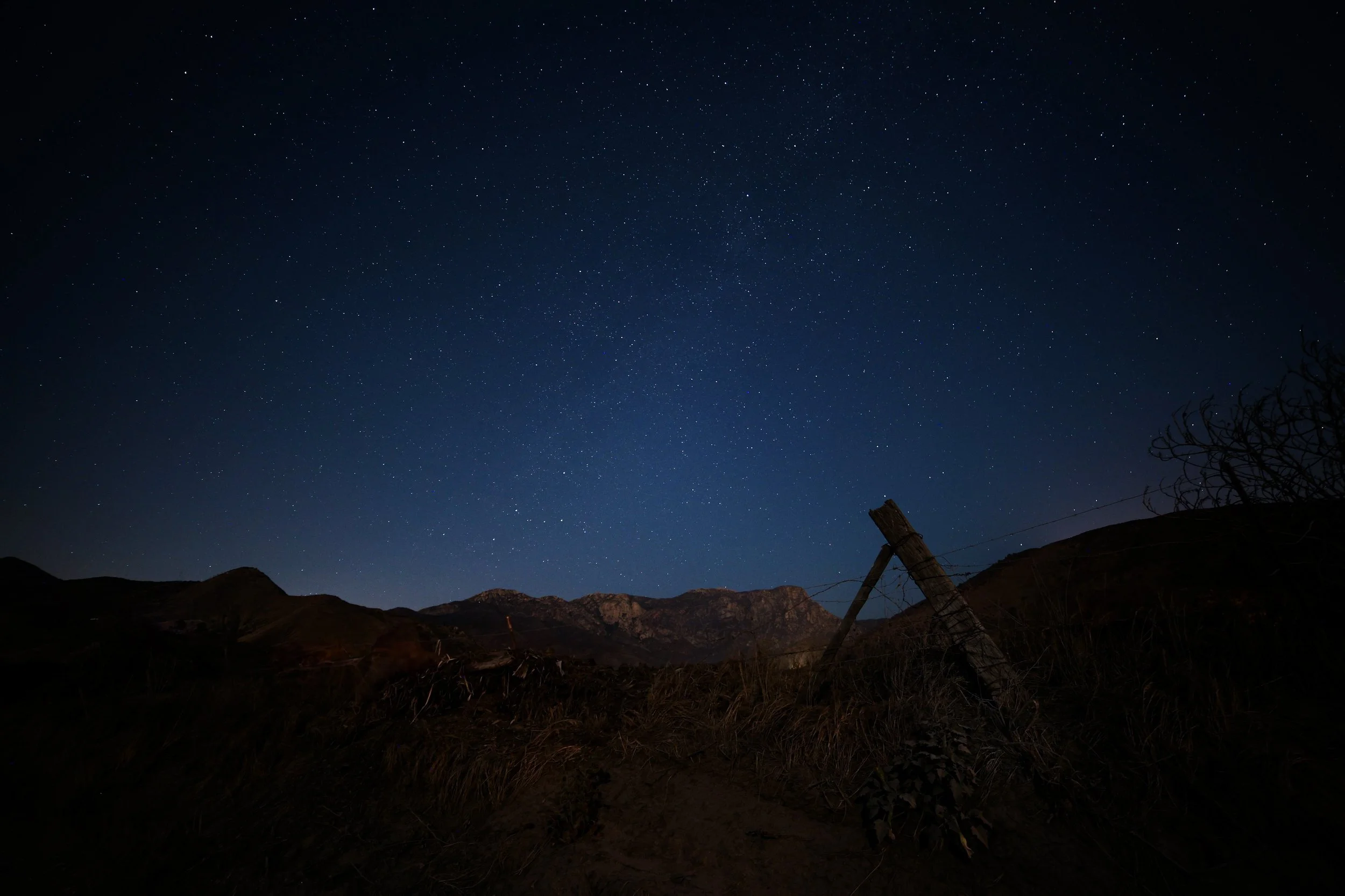 Down Dairy Road in Lakeside, the mountain rose in silhouette beneath the stillness of the stars.