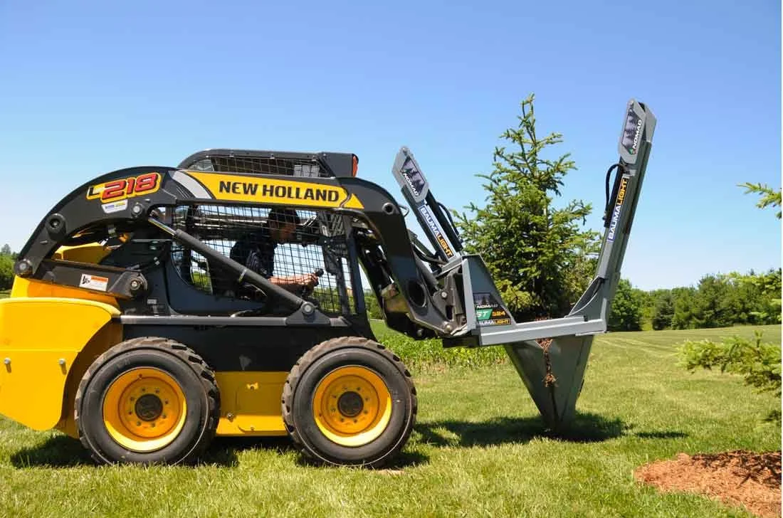 Baumalight-24-inch-tree-spade-on-new-holland-L218-skidsteer.jpg