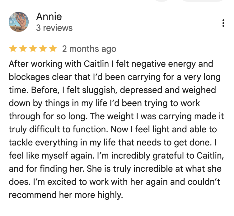 Screenshot of a Google review by Annie praising Caitlin for helping her overcome negative energy and weight-related issues.