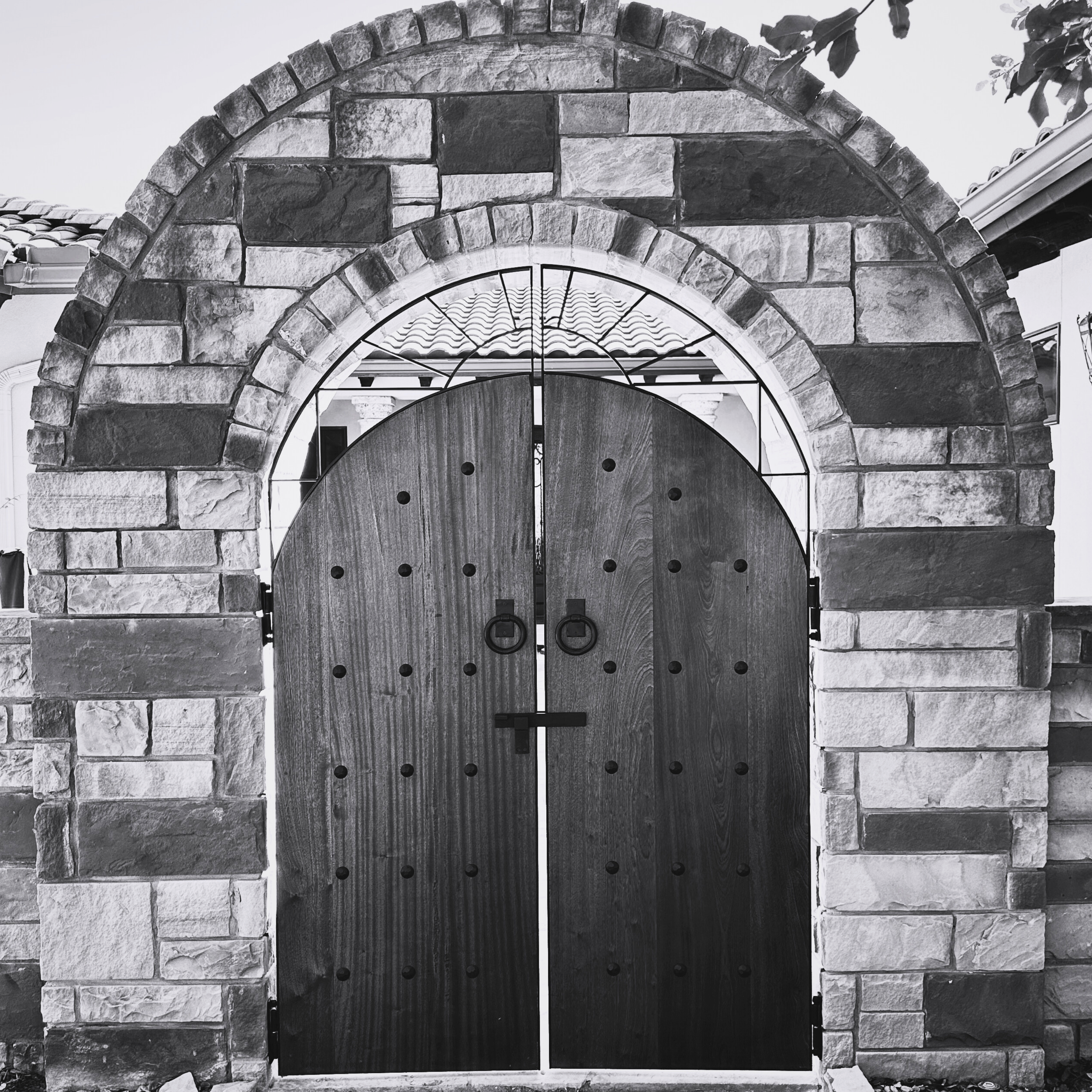 Hot rolled steel frame, with hand finished Mahogany wood, custom latches and pulls.