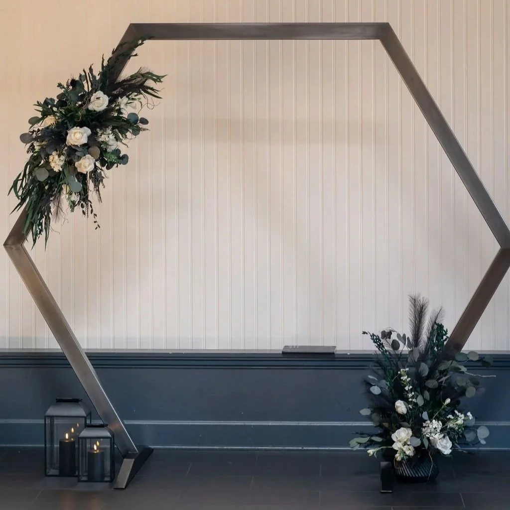 Decorative wedding hexagon-shaped arch. Made from mild steel and blackened finish. 