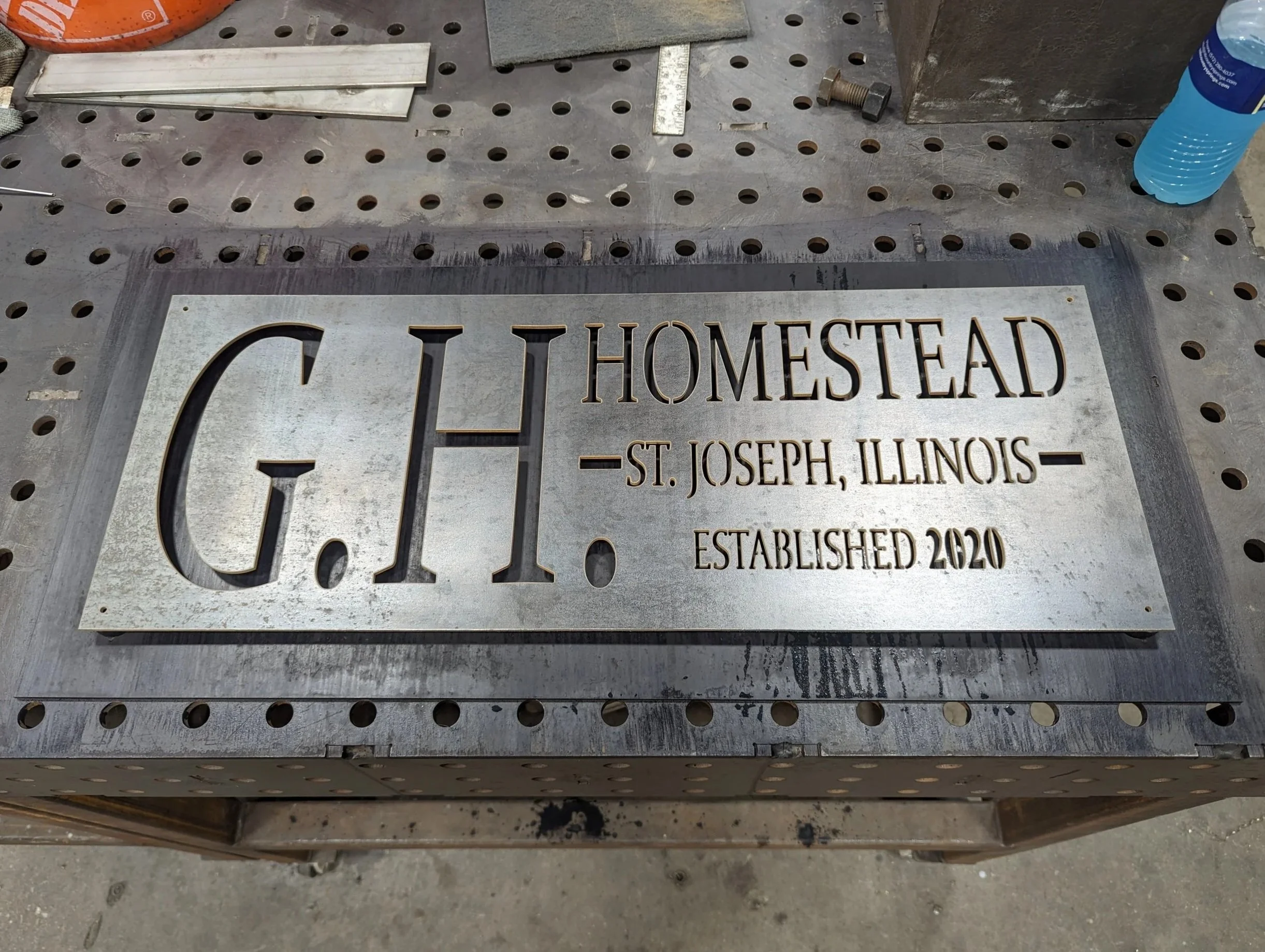 Steel sign made for our clients in Illinois. They wanted it left to the elements to patina naturally. 