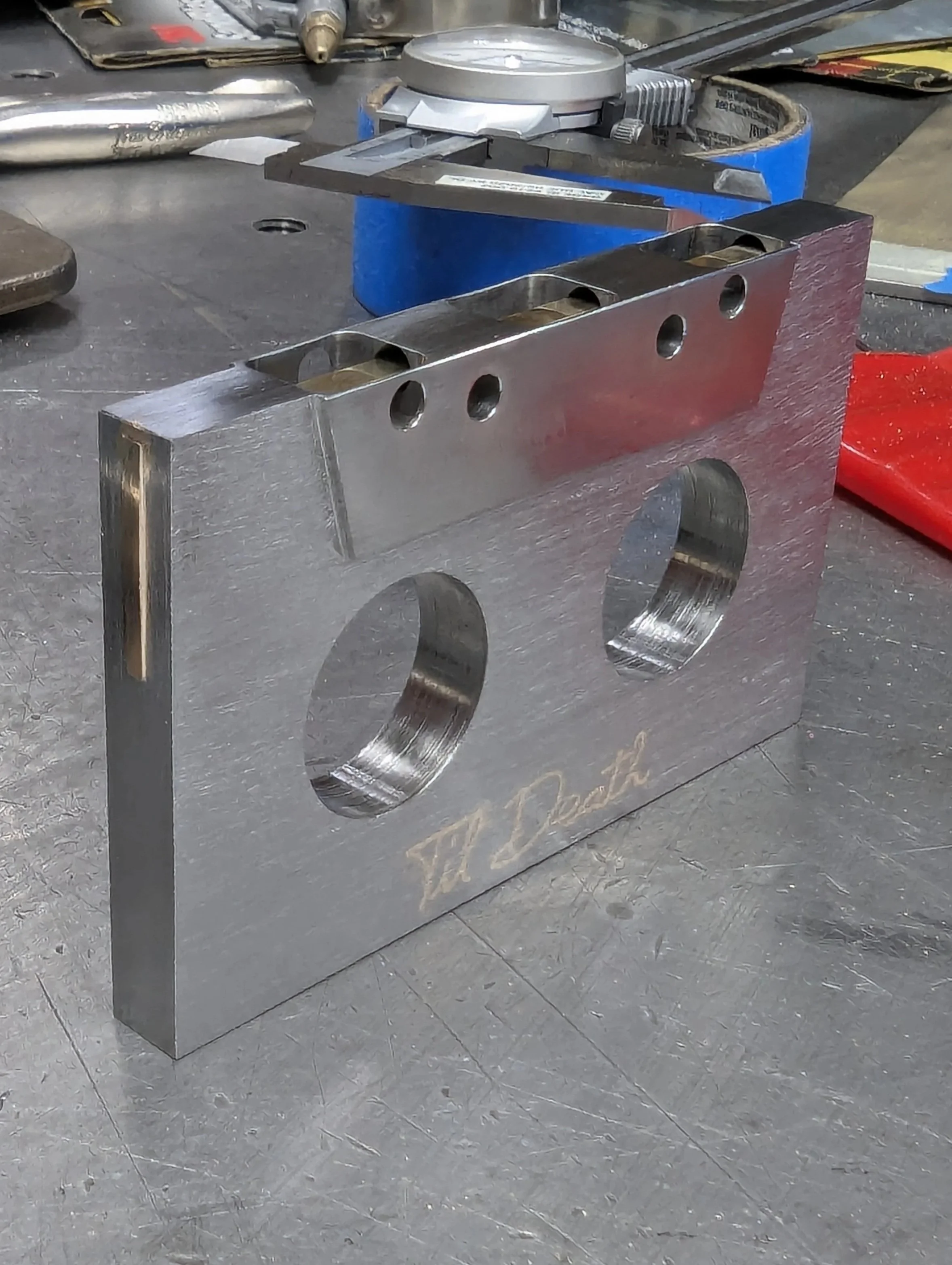 Machined cassette tape out of mild steel with brass inlay. 