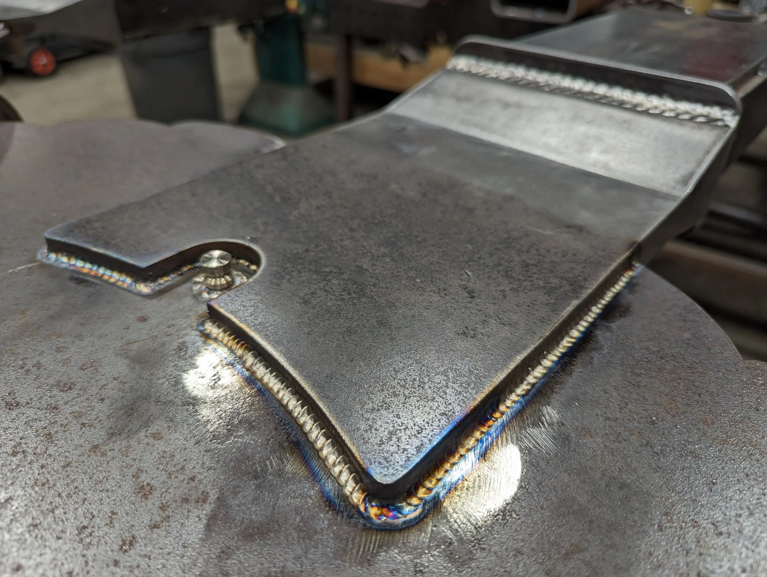 TIG welded steel frame that will act as footing for piece of art. Final finish will be black powder coat. 