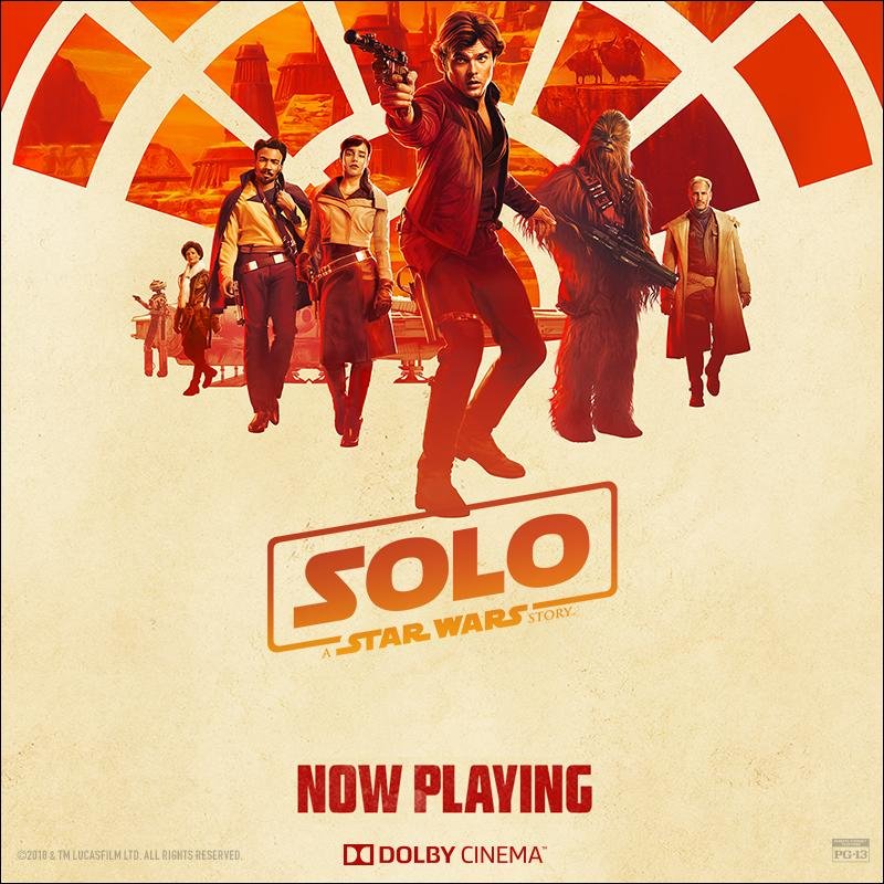 Poster for the movie 'Solo: A Star Wars Story' featuring Han Solo holding a blaster, with other characters and desert landscape in the background, and the text 'Now Playing' and Dolby Cinema logo.