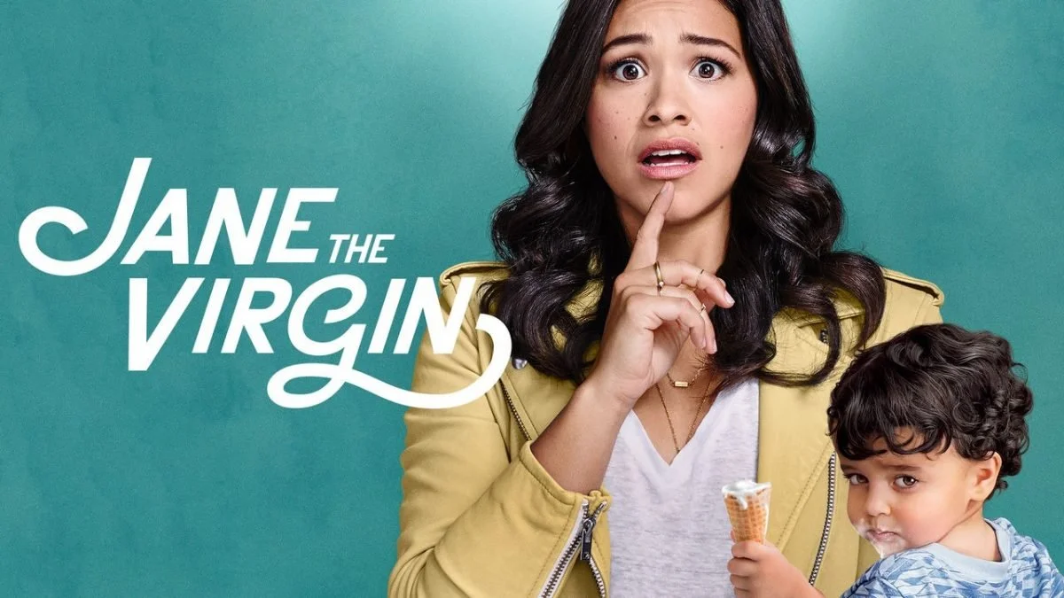 The promotional poster for the TV show "Jane the Virgin" features a woman with dark hair looking surprised or confused, with one finger at her lips. Next to her is a young boy with curly hair holding an ice cream cone, making a mischievous face. The 