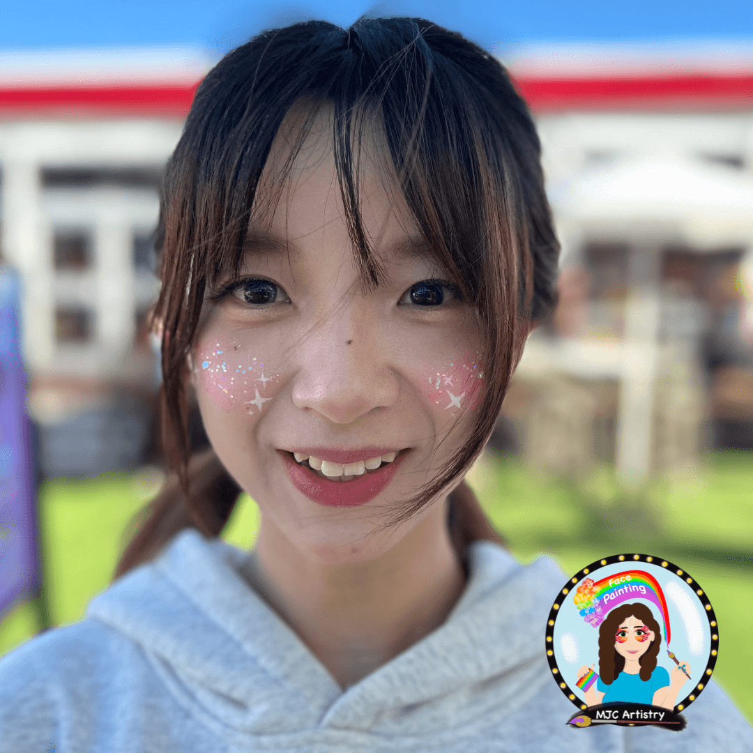 girl-glitter-freckles-face-painting-fifa-world-cup-vancouver-bc-place.png