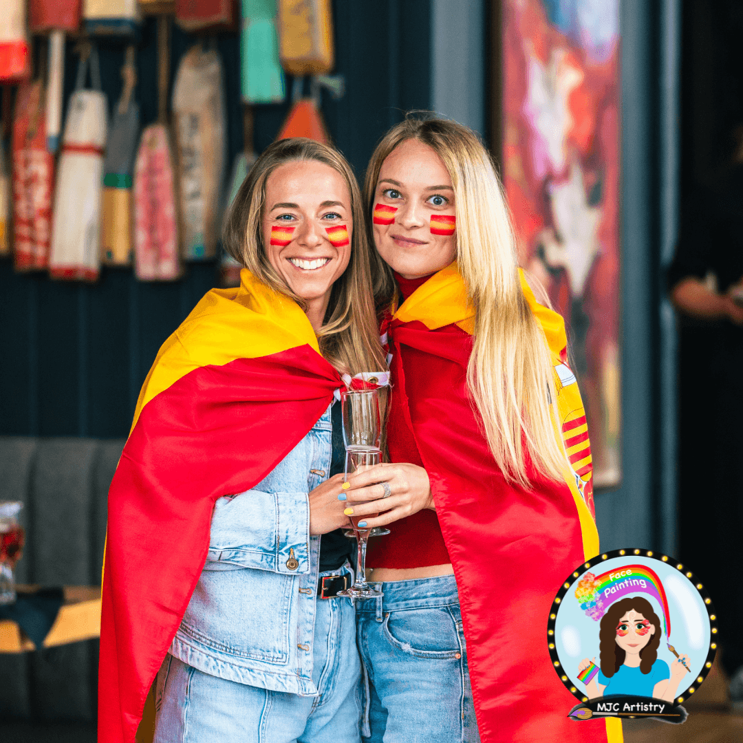 spain-fans-face-painting-flag-corporate-fifa-world-cup-event-granville-island-vancouver.png