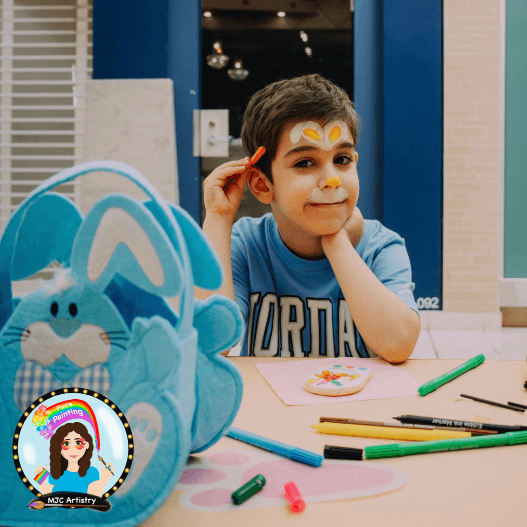 Young boy with bunny face painting in North Vancouver at Capilano Mall easter event 